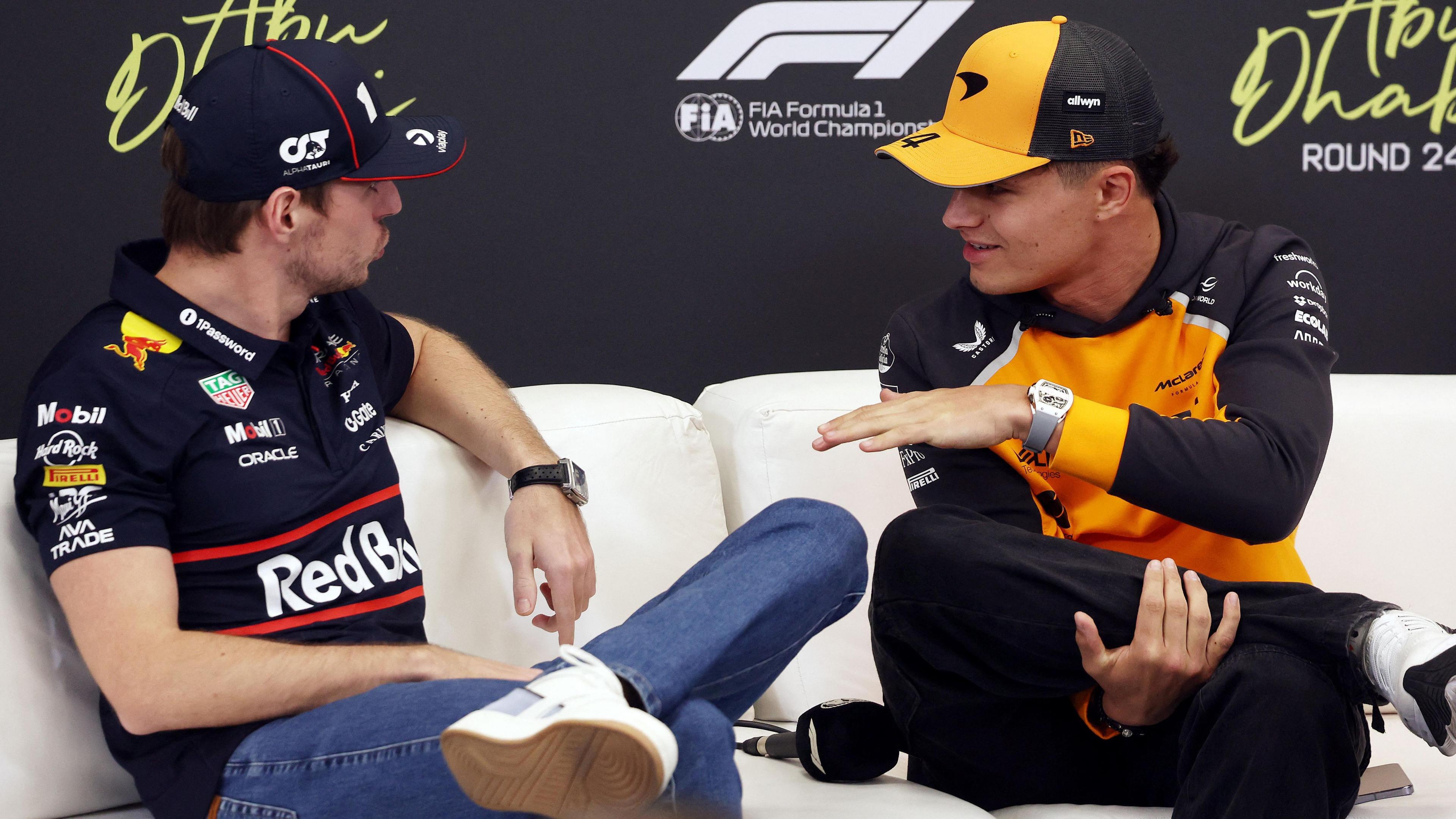 Red Bull's Max Verstappen and McLaren's Lando Norris in conversation during a news conference but last season's title-deciding Abu Dhabi Grand Prix