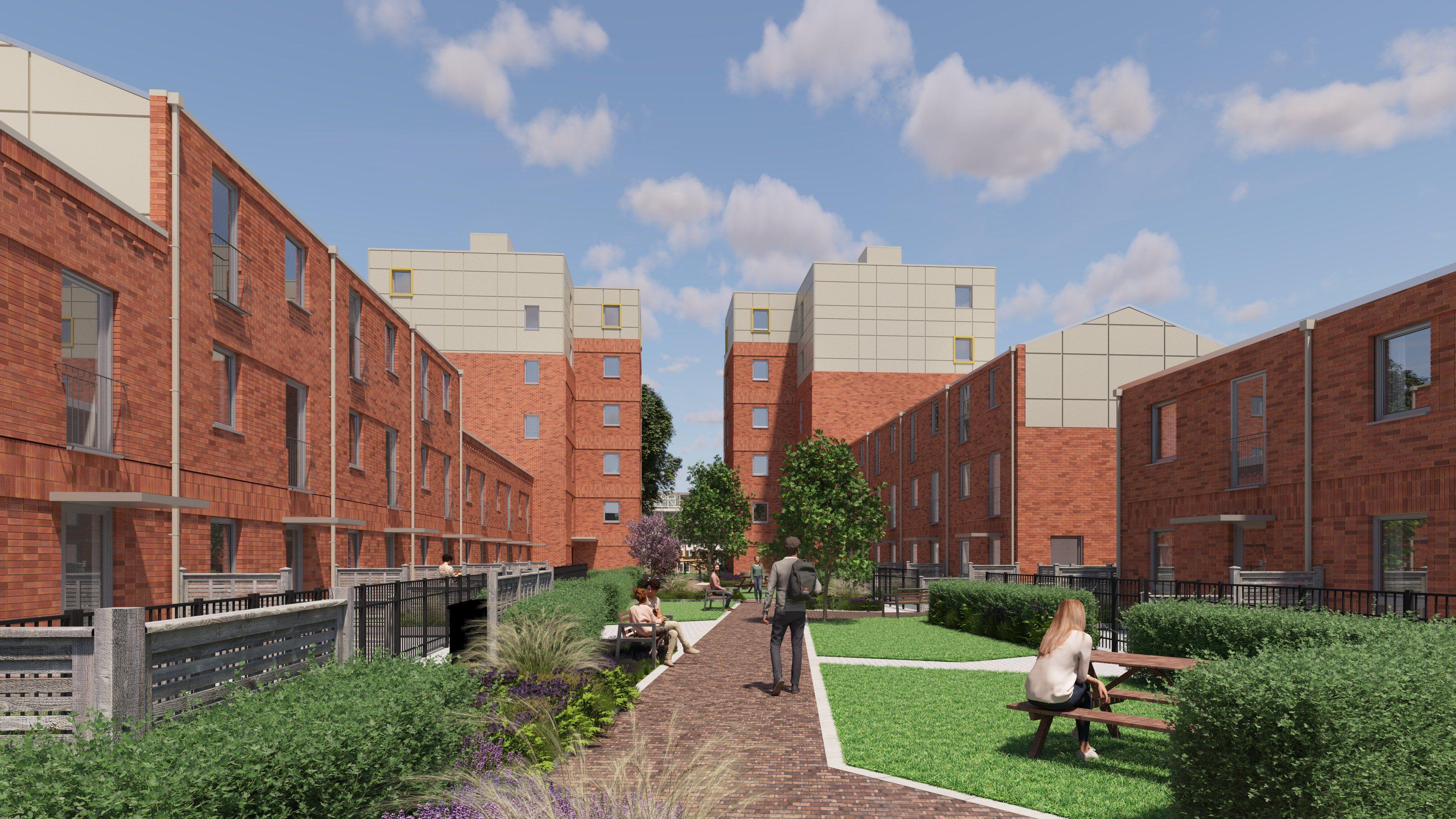 A computer generated image showing what the proposed development would look like. It shows a complex of red brick buildings with lots of windows and a large courtyard area in the middle, complete with picnic benches and green space.