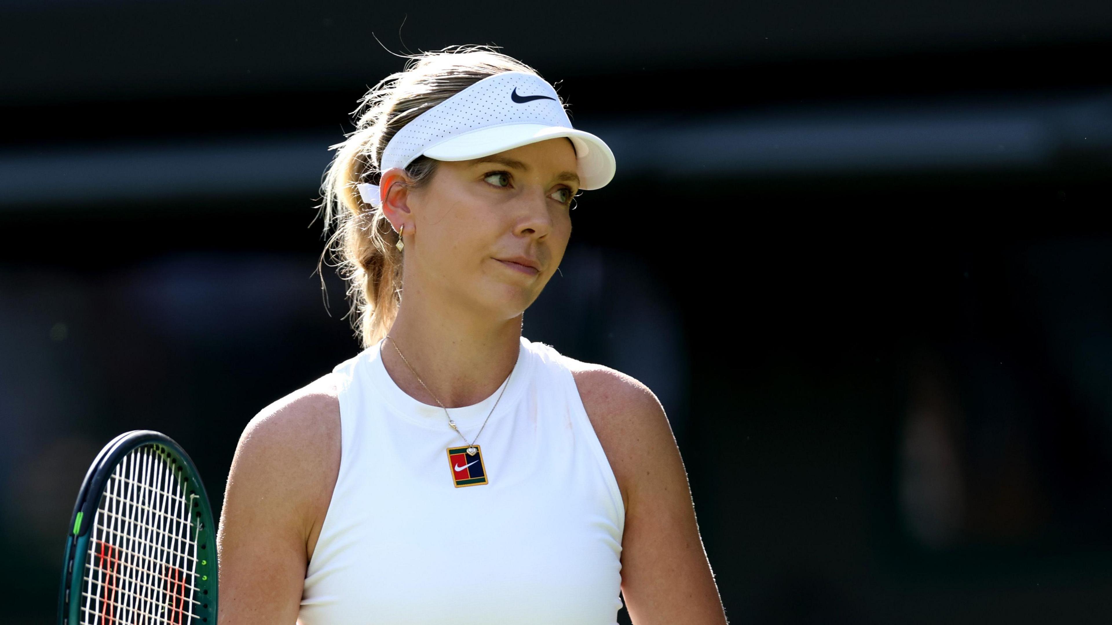 Katie Boulter looks dejected during her Wimbledon defeat by Solana Sierra