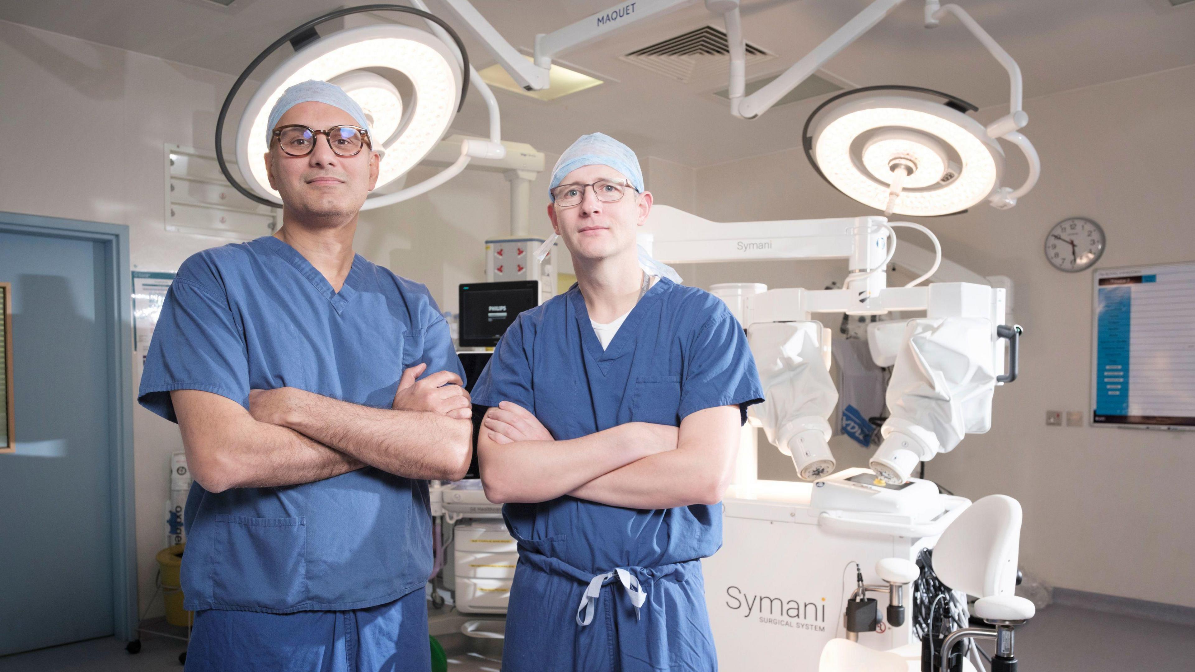 Aadil Khan (Consultant Plastic Surgeon and Reconstructive Surgeon) and Kieran Power (Head of the Plastic Surgery Unit and Consultant Plastic and Reconstructive Surgeon) with the Symani Surgical System by MMI (Medical Microinstruments Inc.) at The Royal Marsden in London