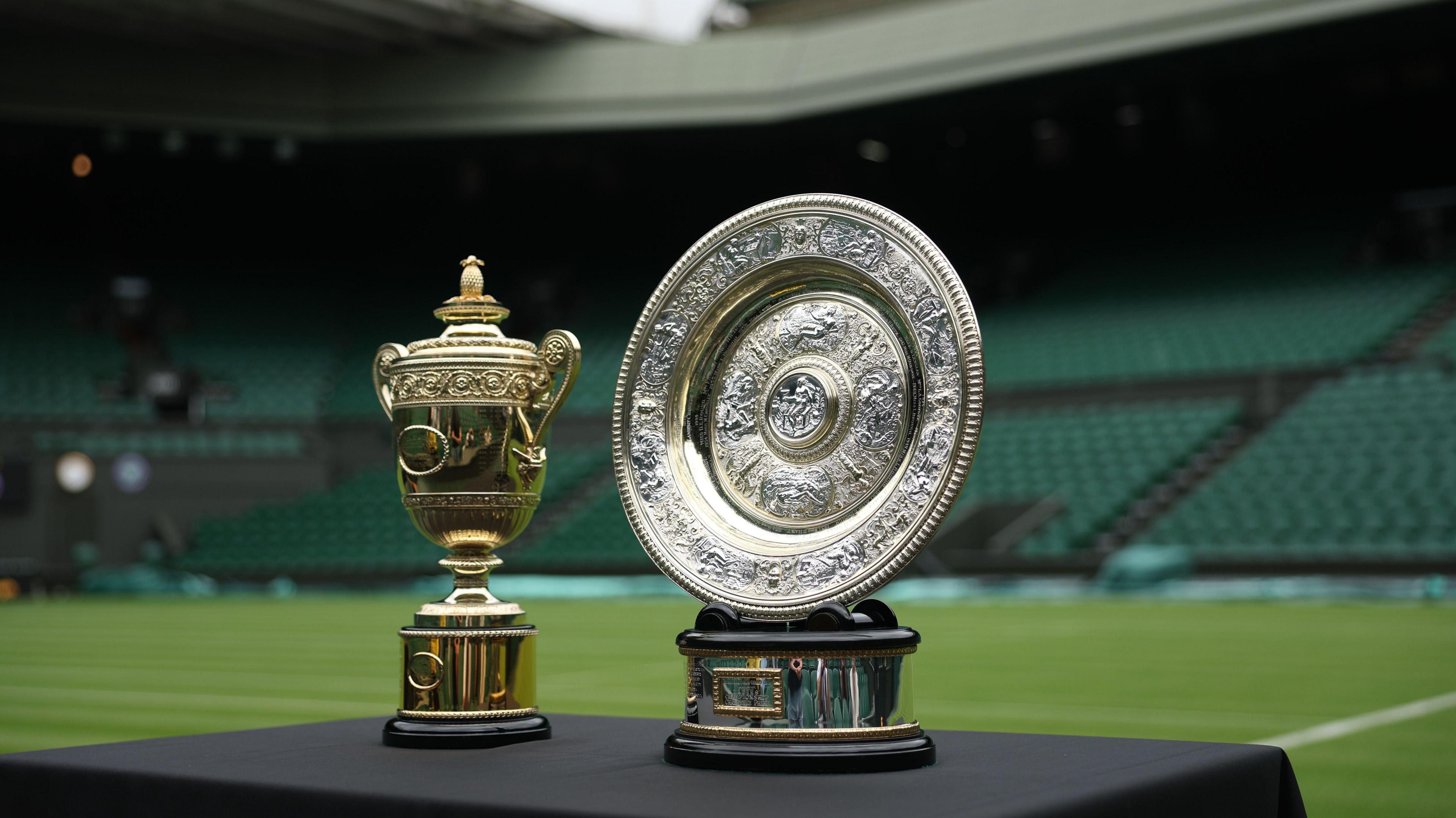 A general view of the Gentlemen's Singles Trophy, The Cup, and Ladies' Singles Trophy, the The Venus Rosewater Dish, prior to The Championships Wimbledon 2025