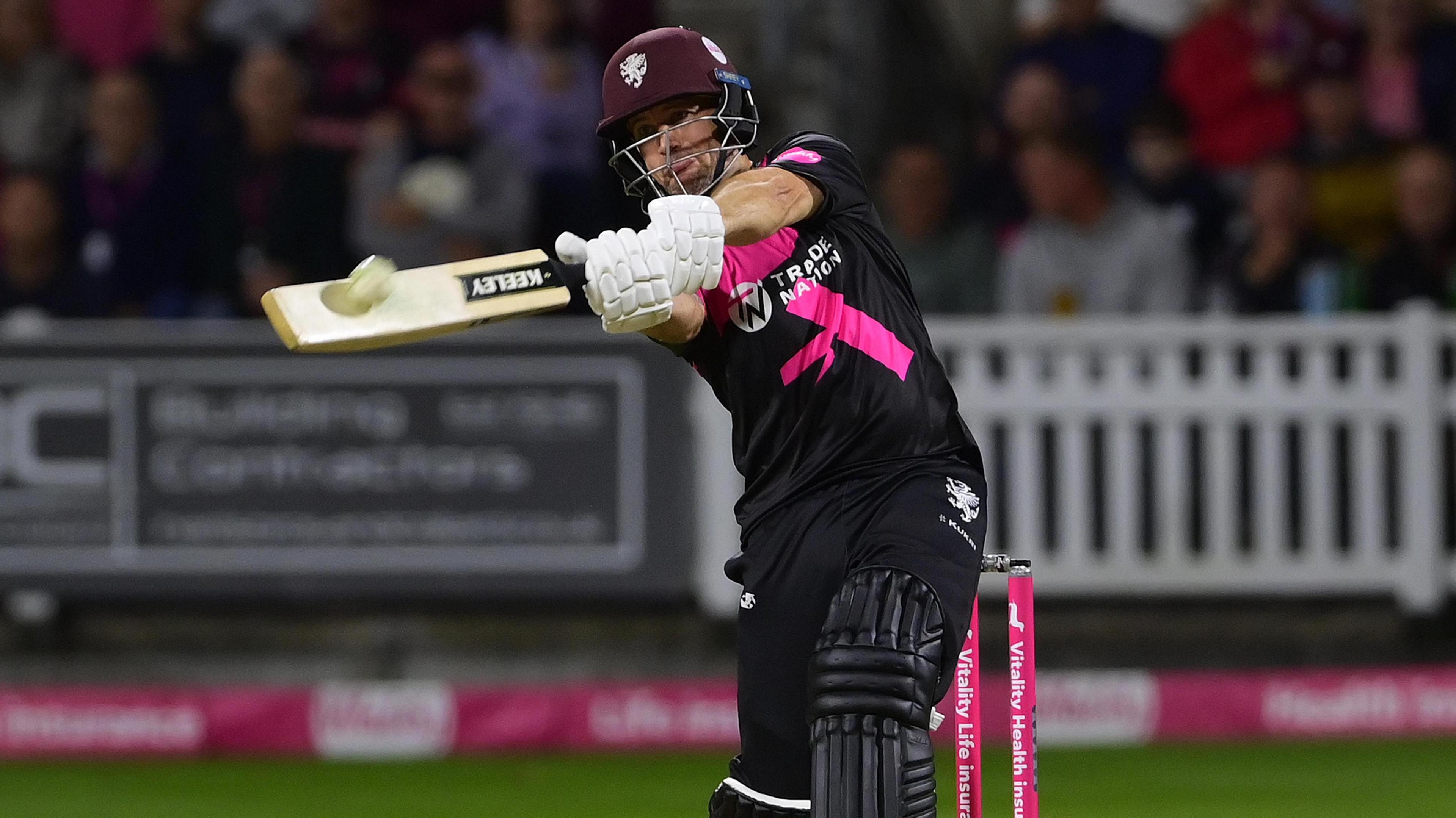 Somerset's Sean Dickson hitting a boundary against Bears