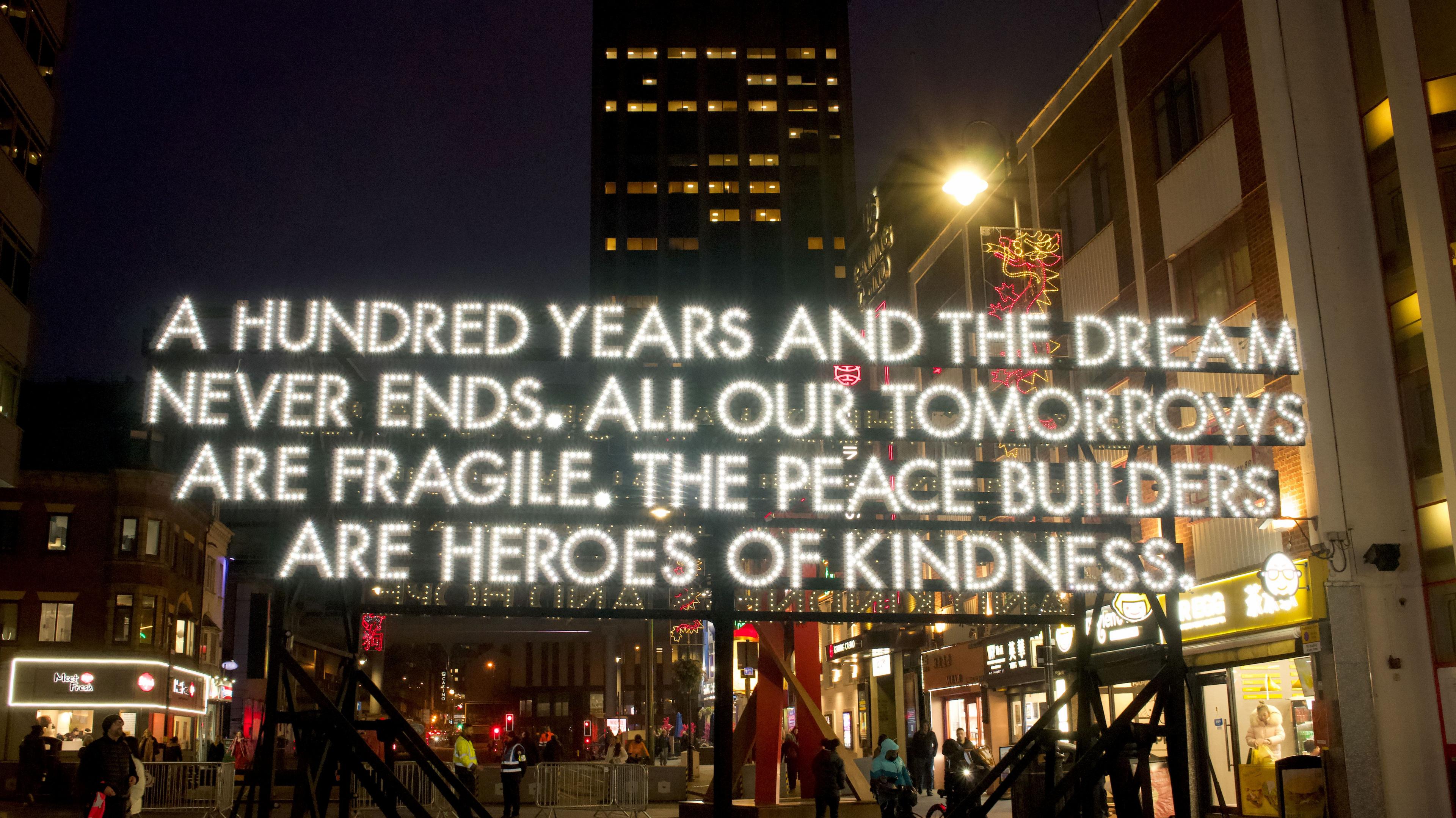 An illuminated poem. A hundred years and the dream never ends. All out tomorrows are fragile. The peace builders are heroes of kindness