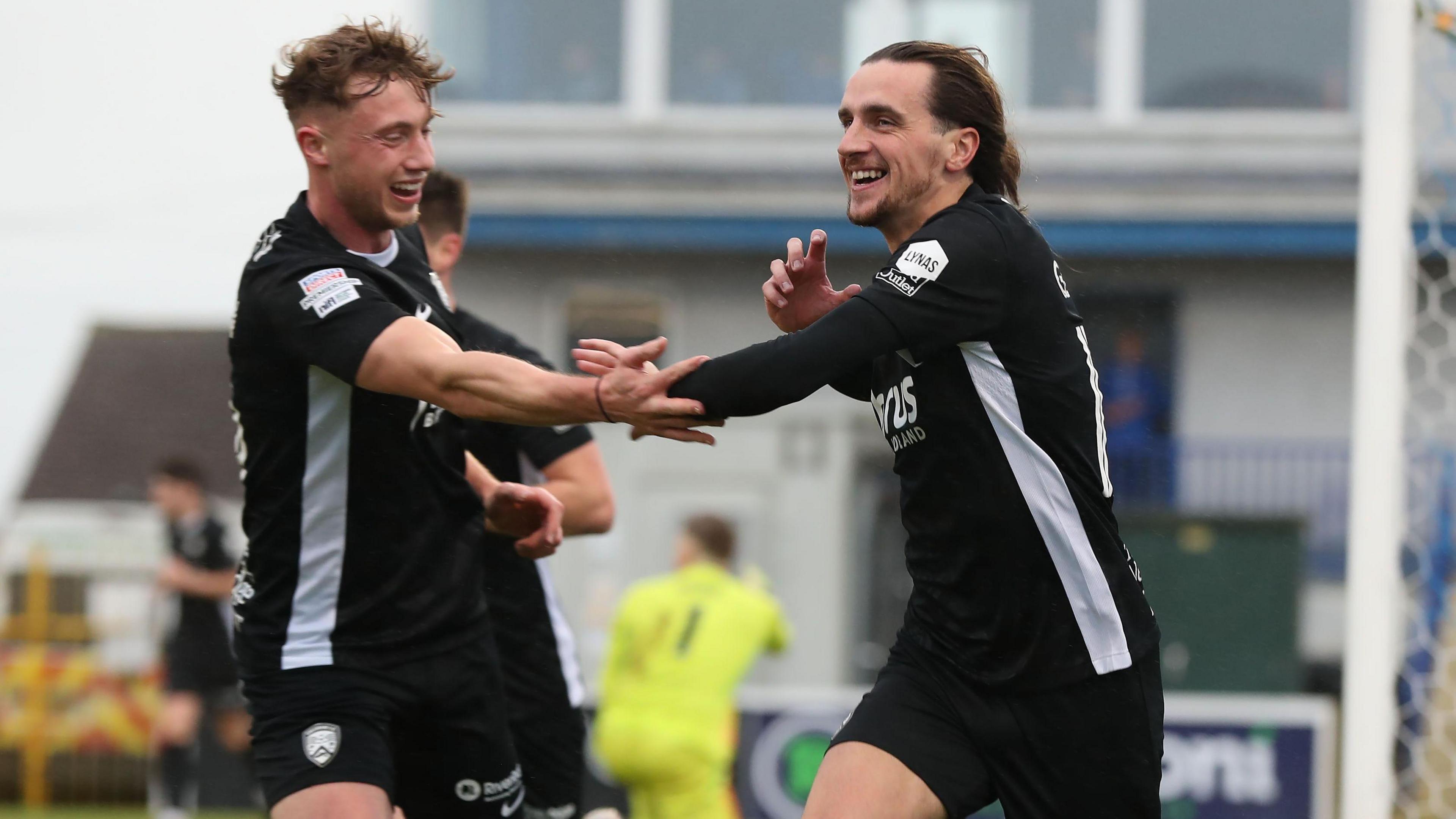 Matthew Shevlin and Jamie Glackin celebrate