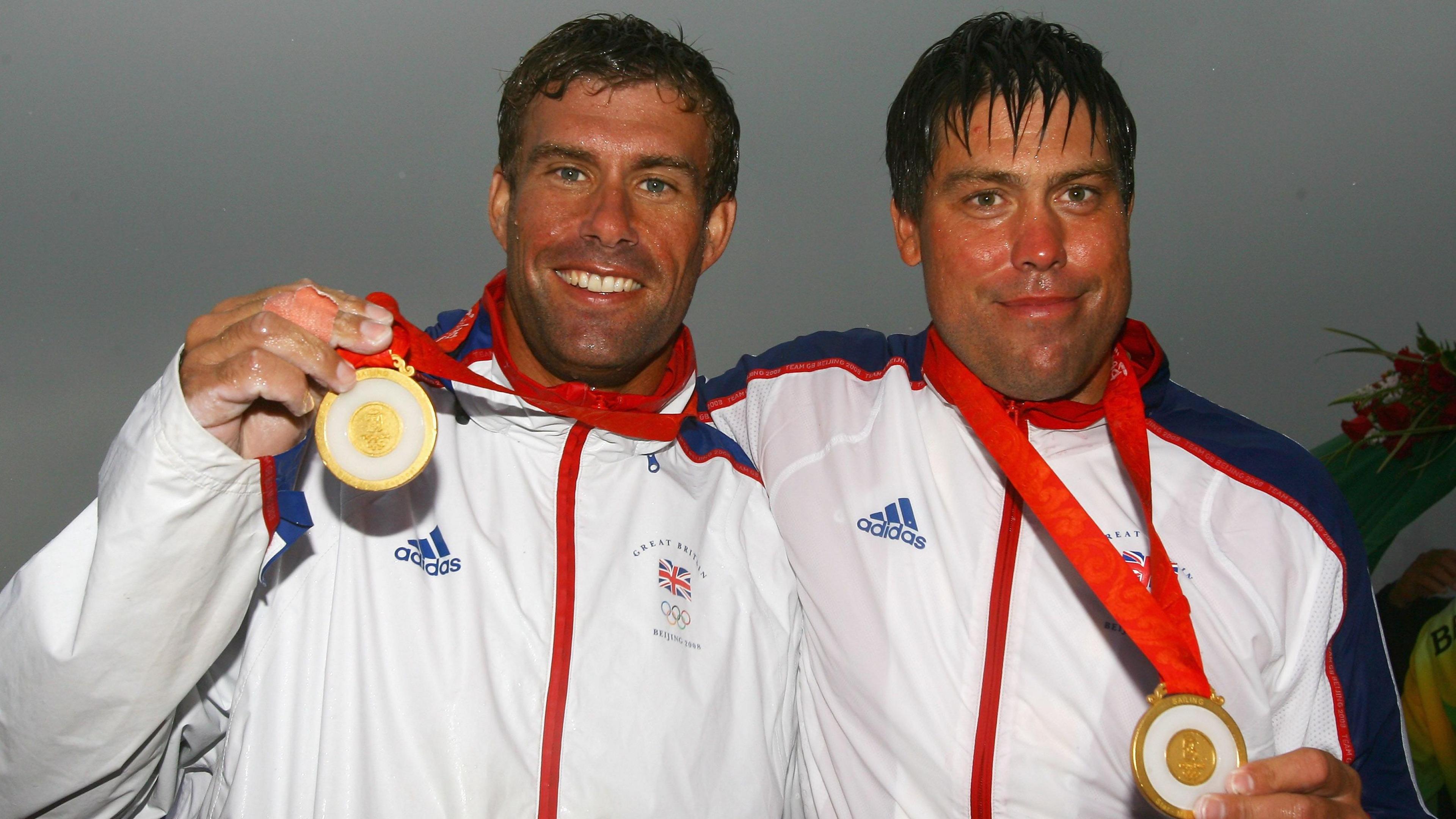 Iain Percy and Andrew Simpson of Great Britain receive their gold medals for winning the Star class event held at the Qingdao Olympic Sailing Center during day 13 of the Beijing 2008 Olympic Games on August 21, 2008.