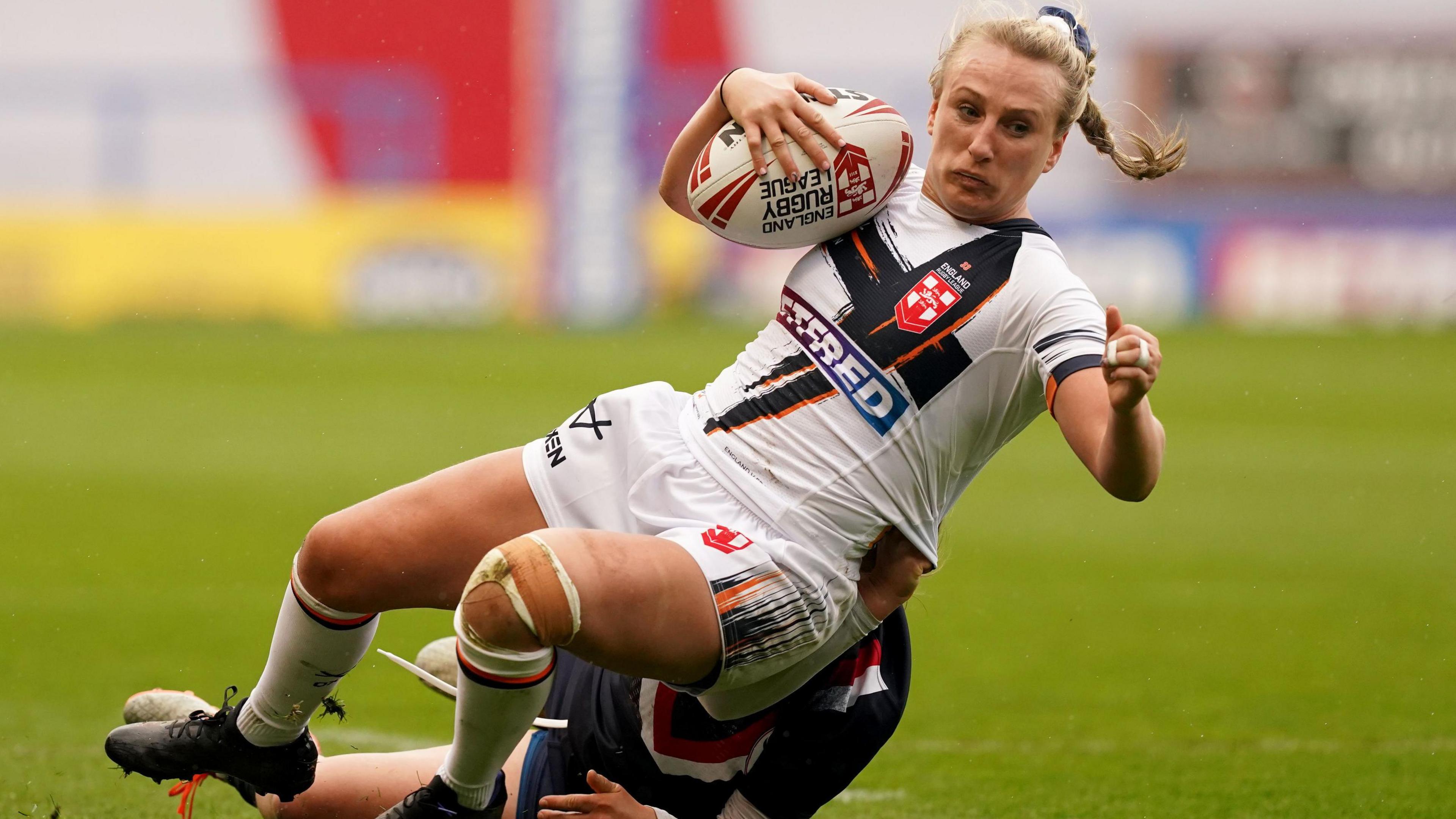 England captain Jodie Cunningham being tackled