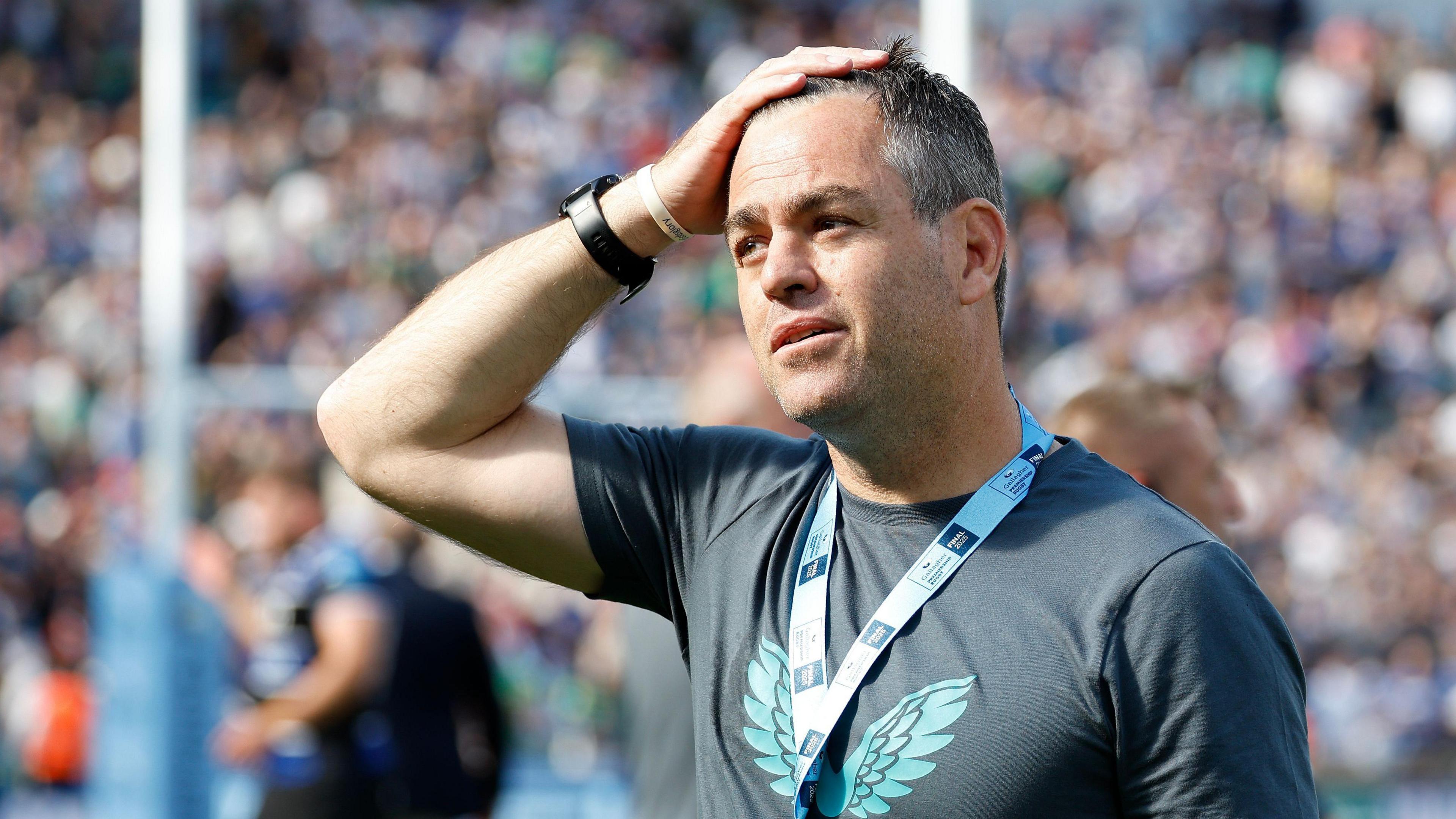 Johann van Graan at the final whistle on the pitch at Allianz Stadium Twickenham