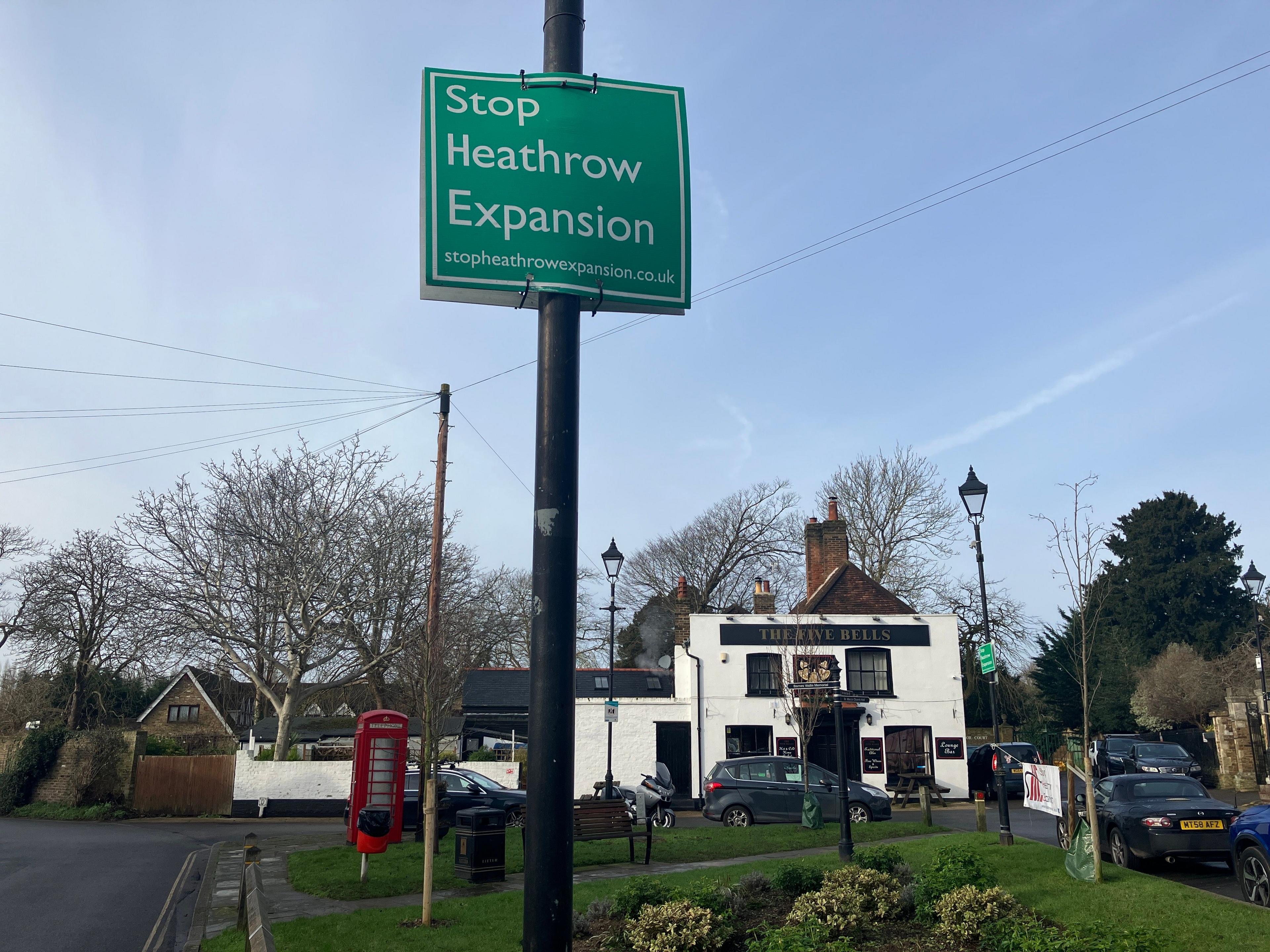 Harmondsworth Village Green with stop Heathrow expansion signs