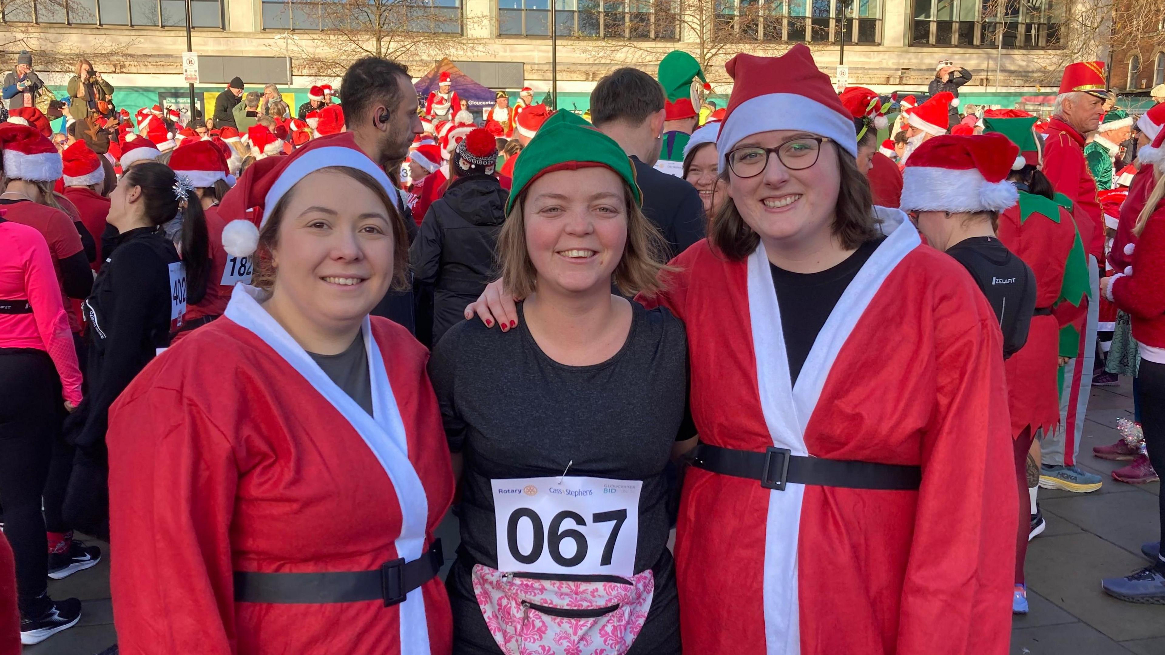 Karen Reid, Janna Hinchliff and Annderley Hill in festive clothes