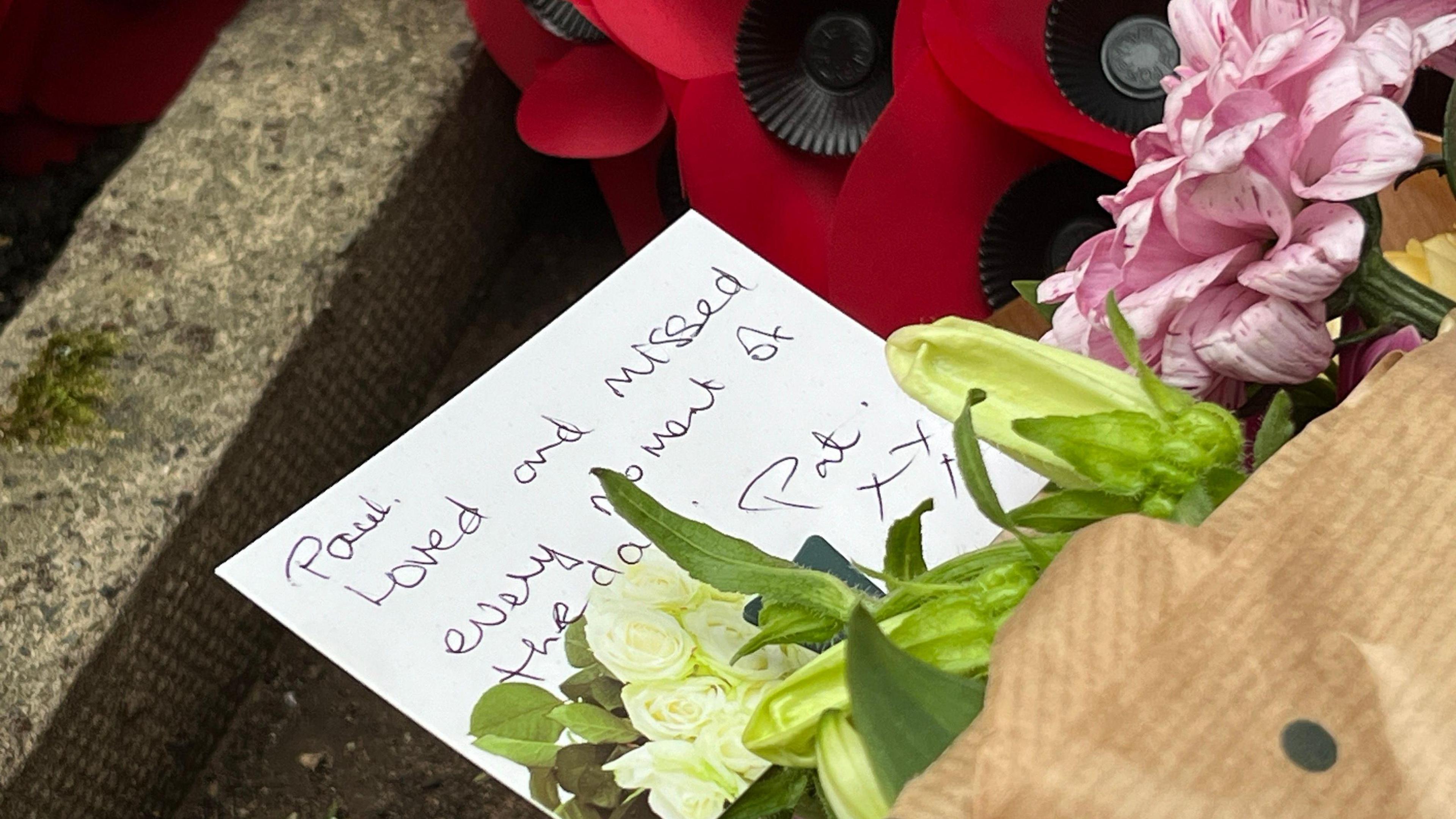 A wreath and a message laid in Guildford on Sunday