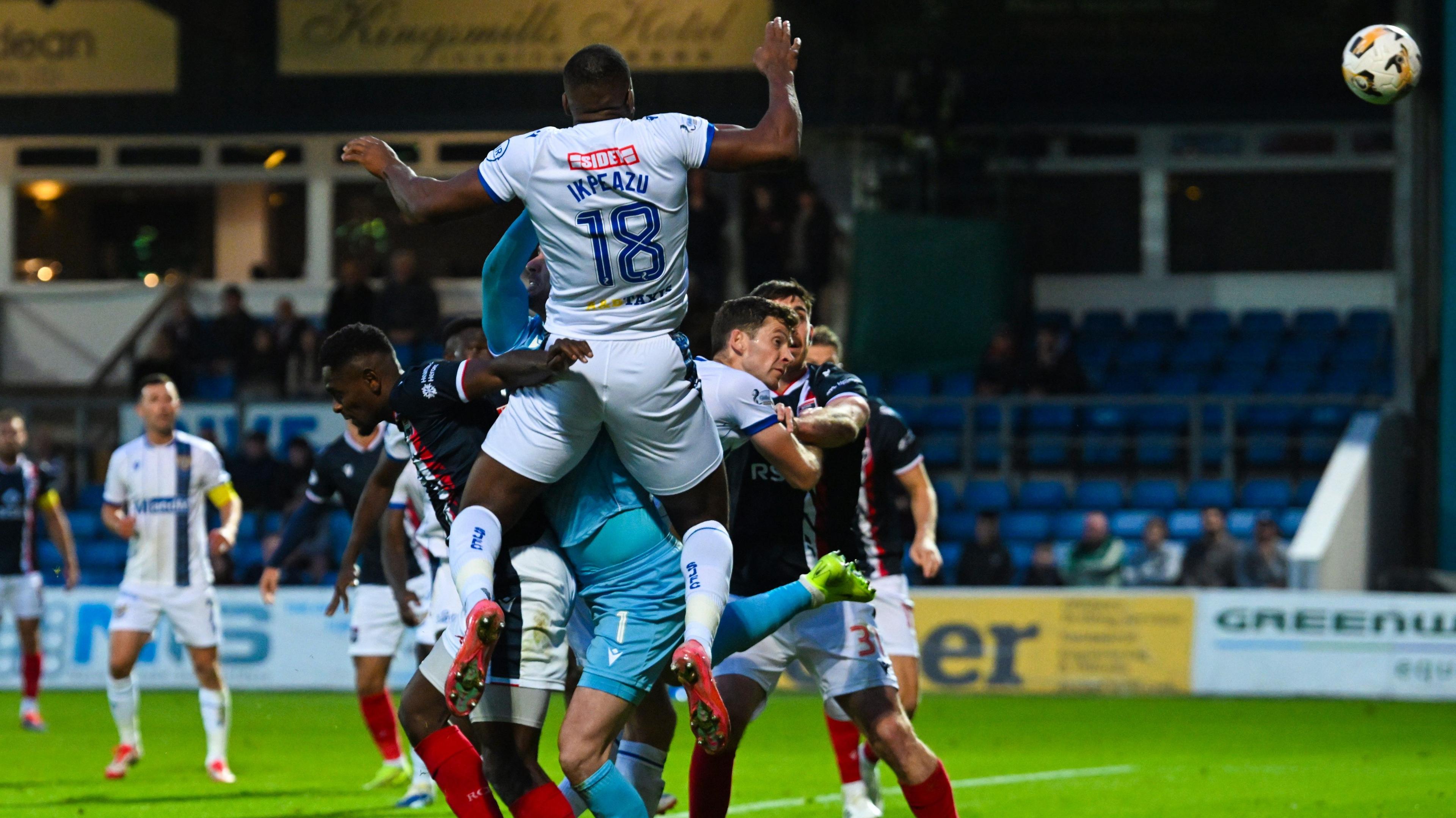 St Johnstone's Uche Ikpeazu scores