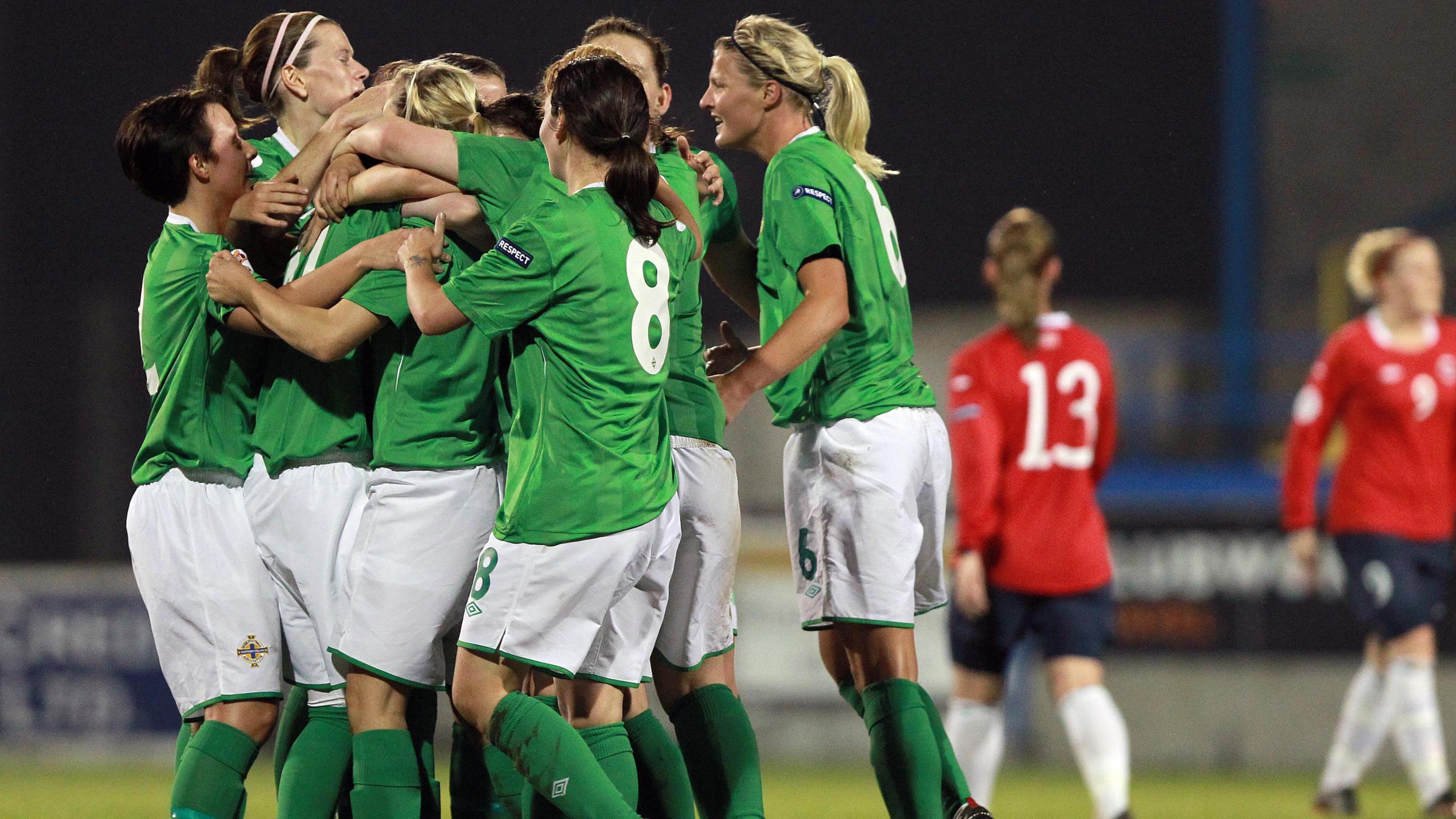 Northern Ireland players celebrate a goal in the shock 3-1 win over Norway in 2011