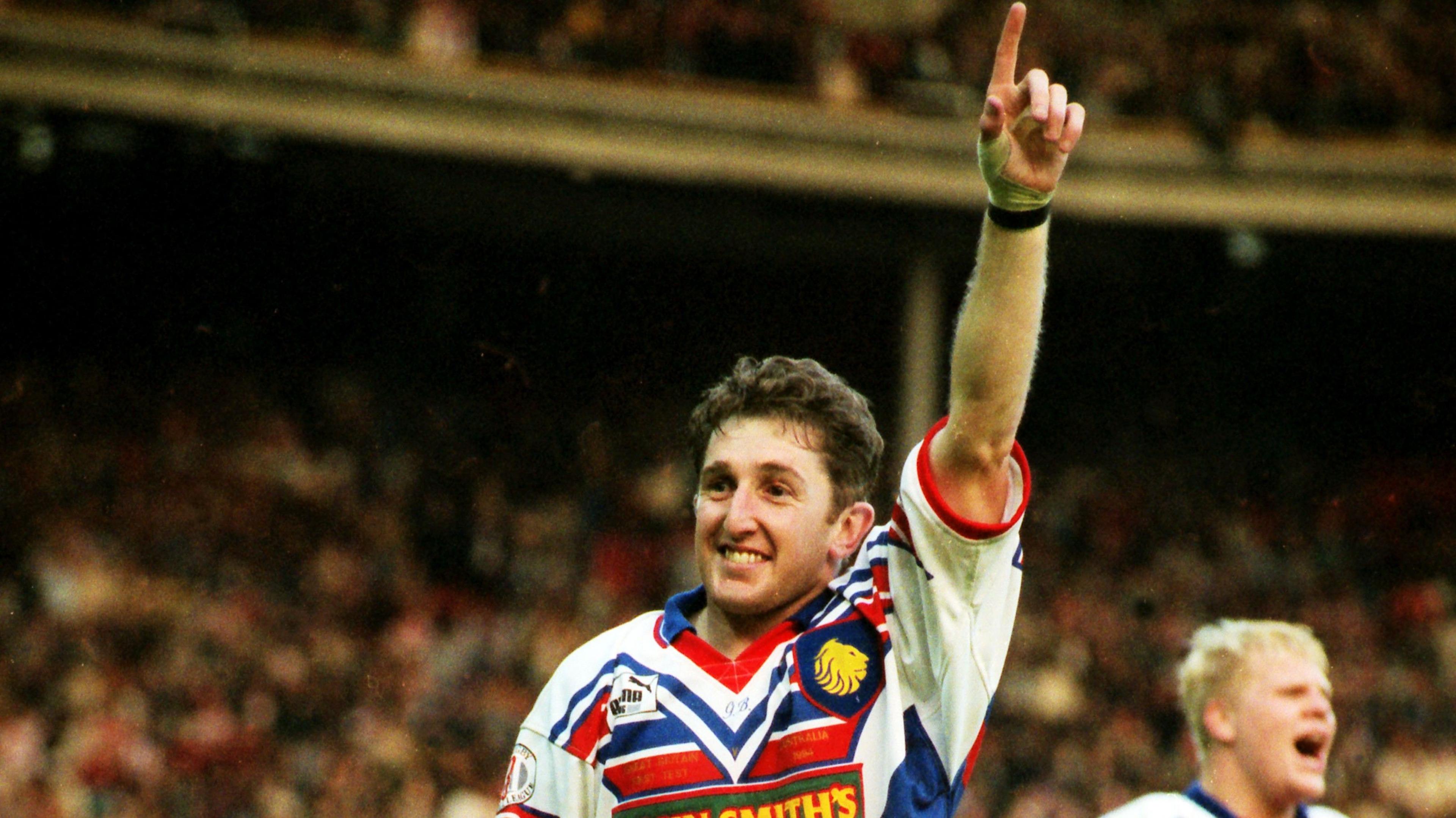 Jonathan Davies celebrates a try