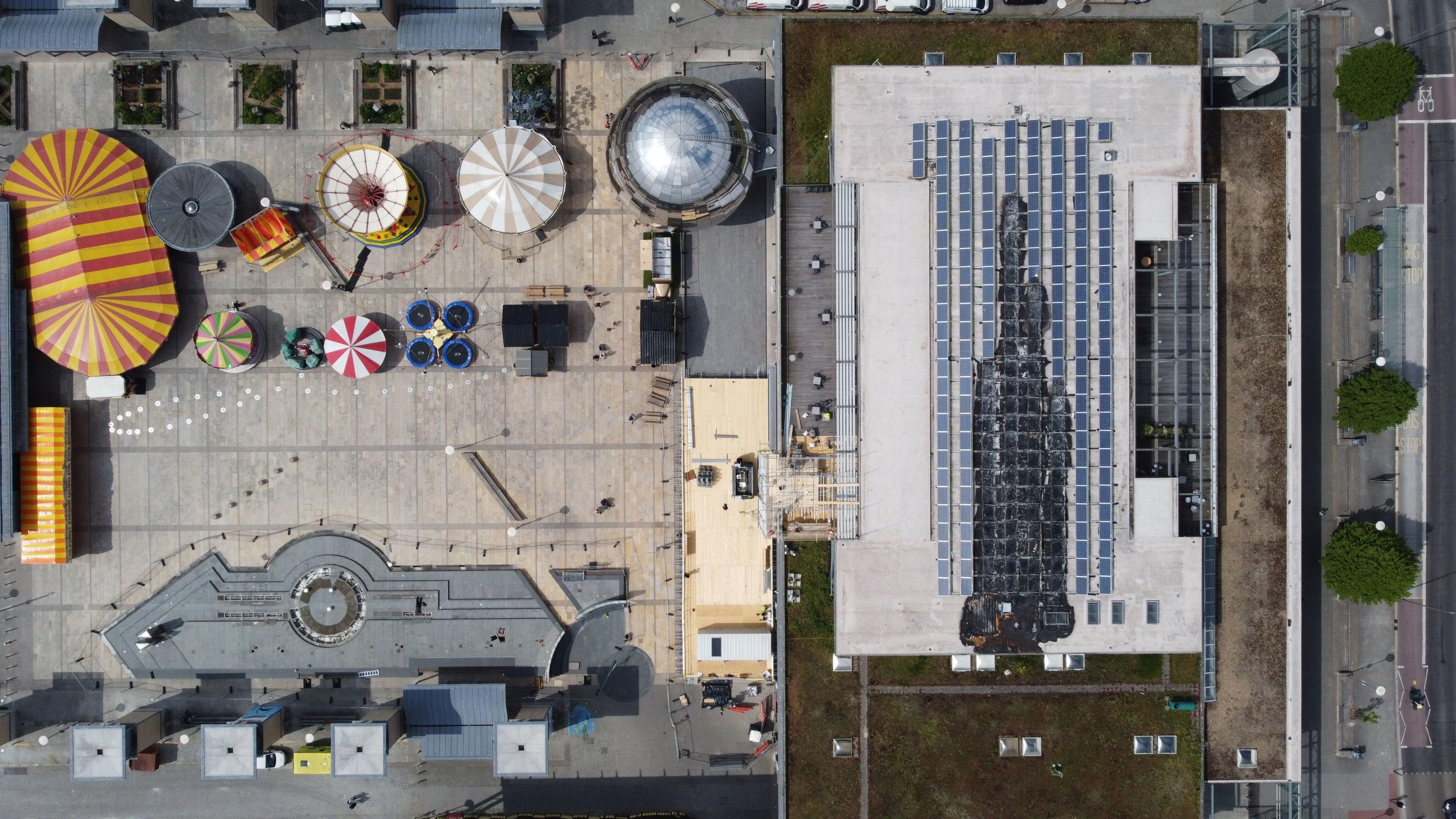 An overhead image of We The Curious, and Millennium Square, showing the fire damage to the solar panels