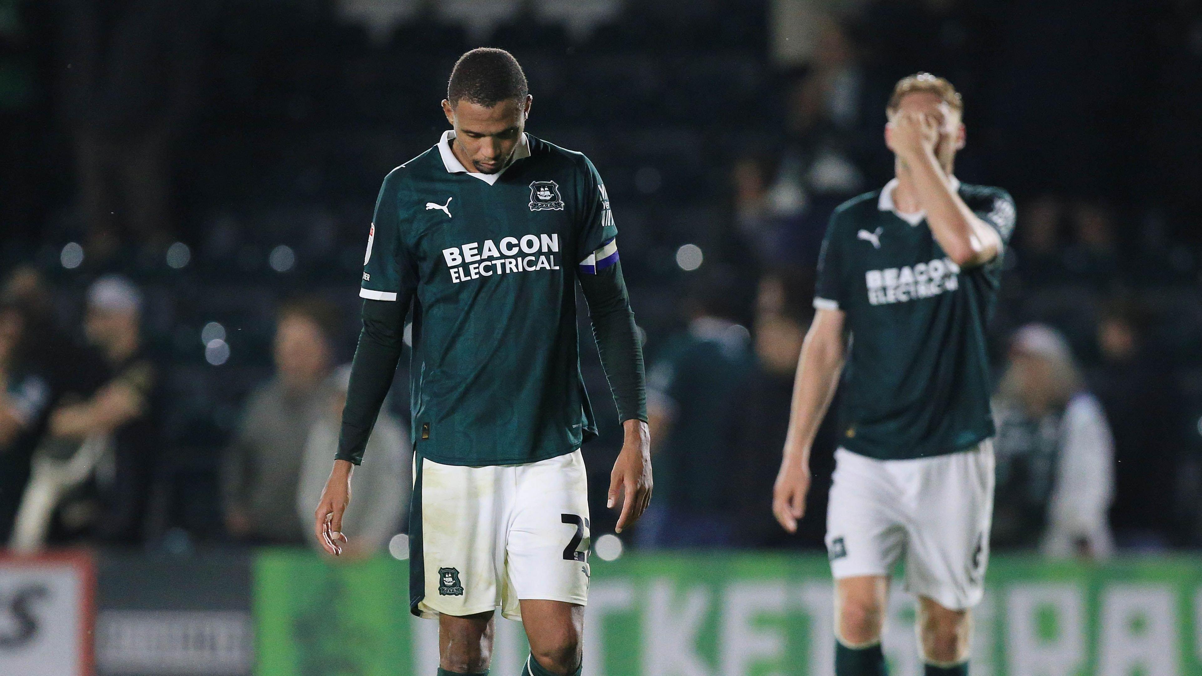 Brendan Galloway with his head down