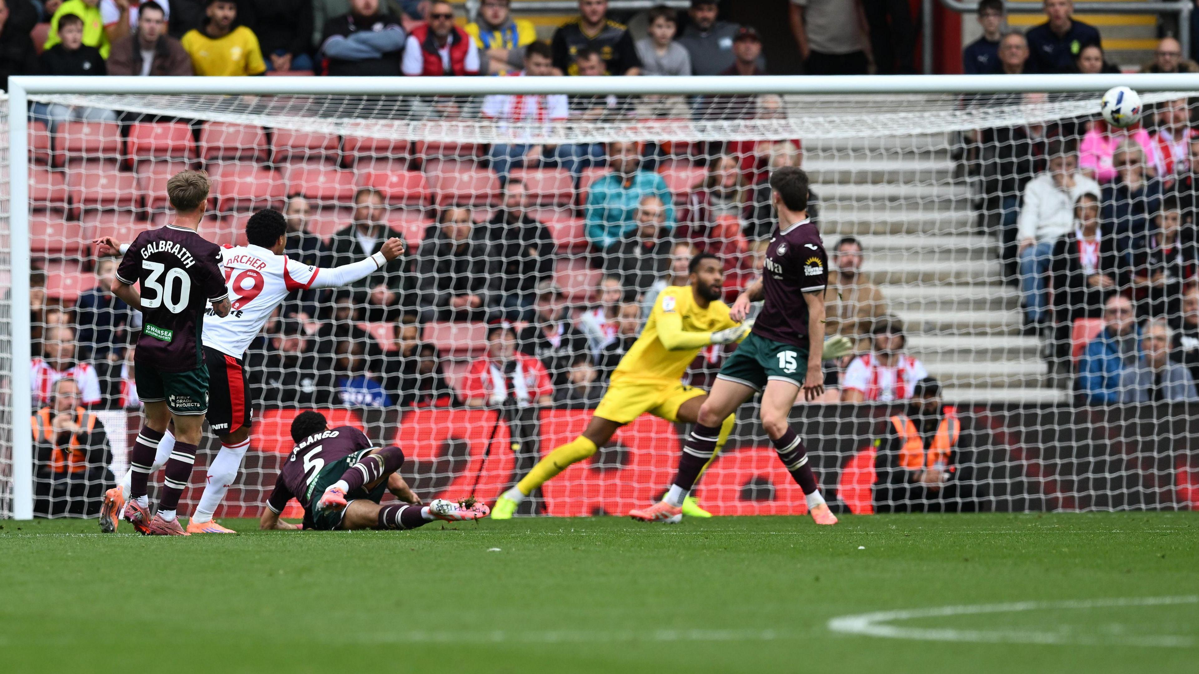 Cameron Archer sends a shot wide and over the Swansea goal