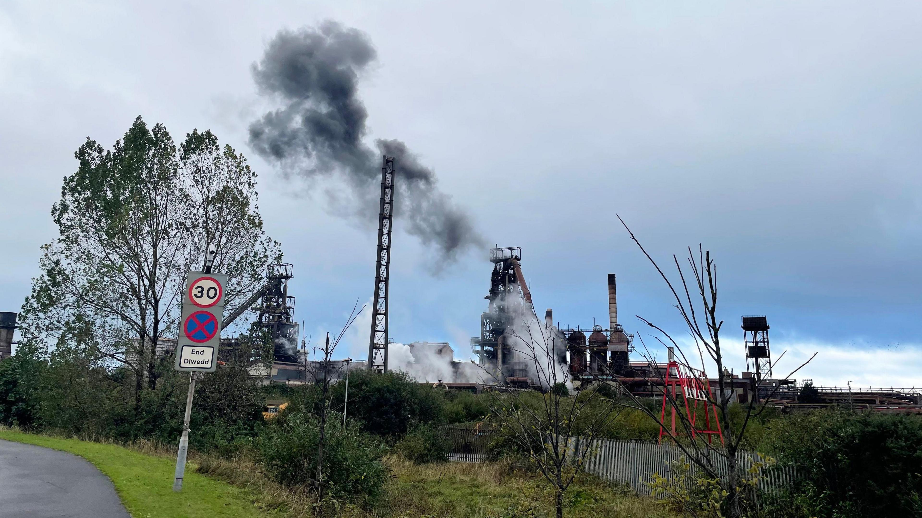 Huge plumes of smoke are emitted from the Tata Steelworks in Port Talbot. 