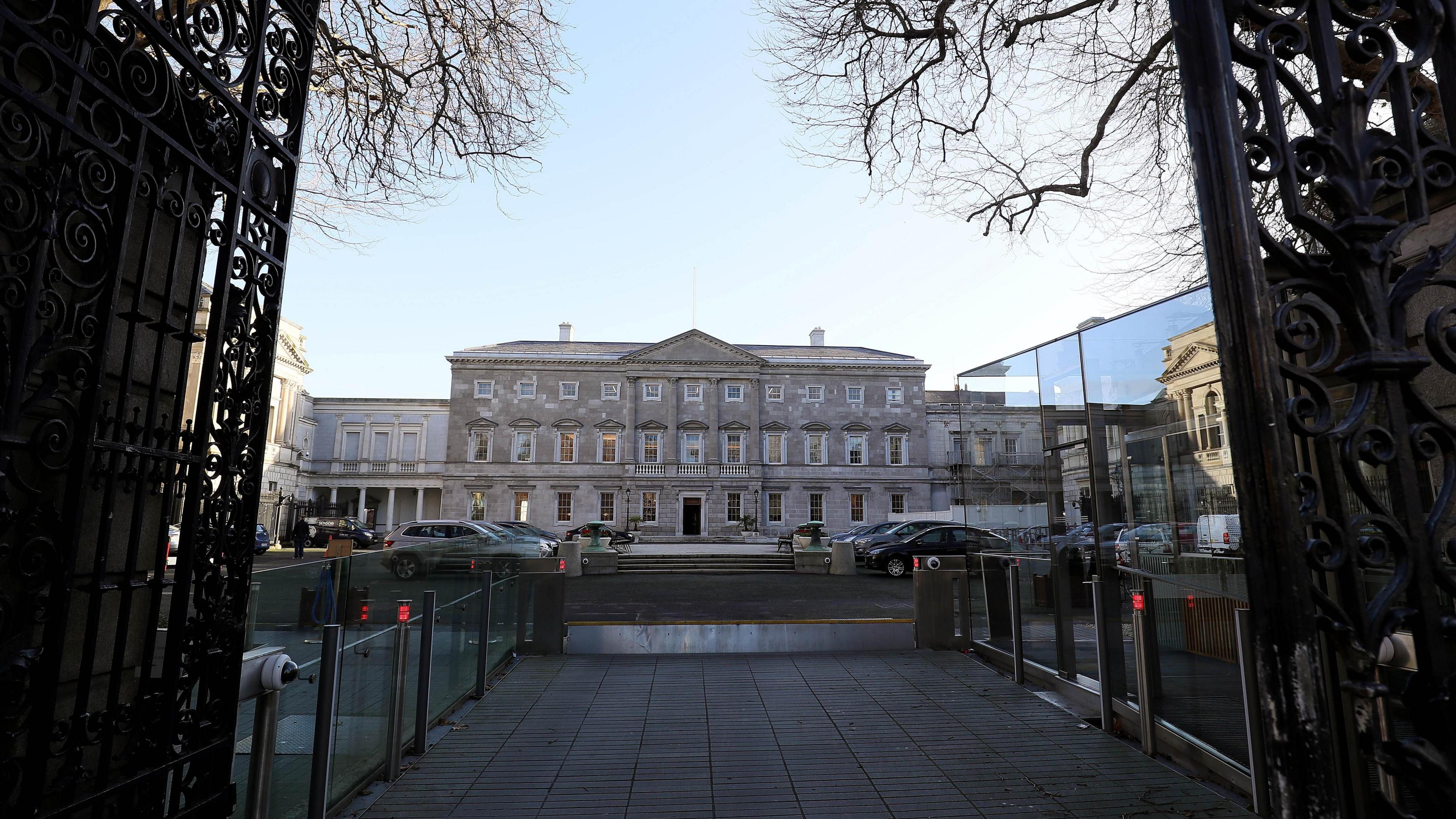 A photo of the Irish Parliament from its gates, during the day