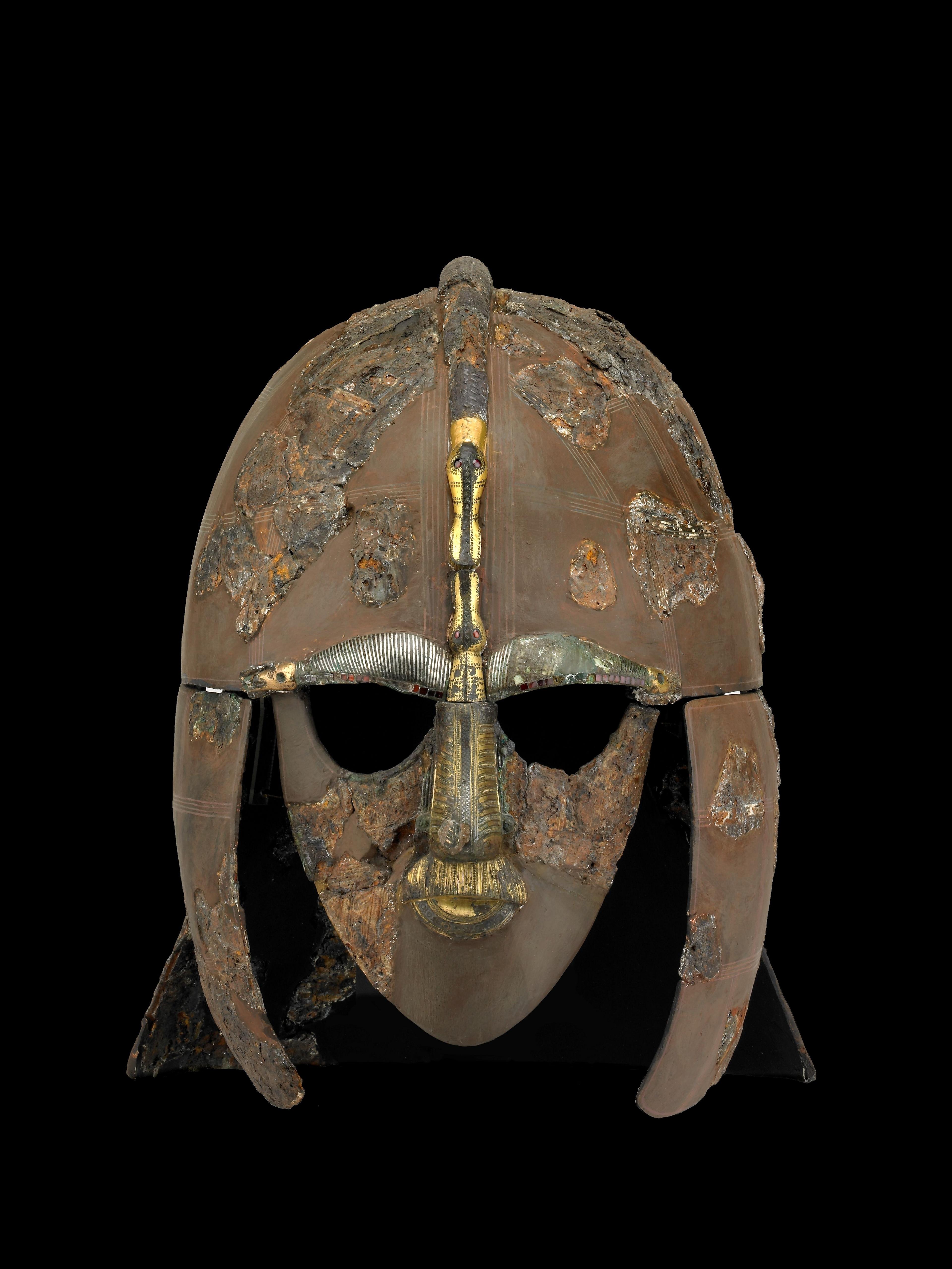 picture show an ornate iron helmet, dating to the early AD 600s, this outstanding burial clearly commemorated a leading figure of East Anglia, the local Anglo-Saxon kingdom. It may even have belonged to a king.