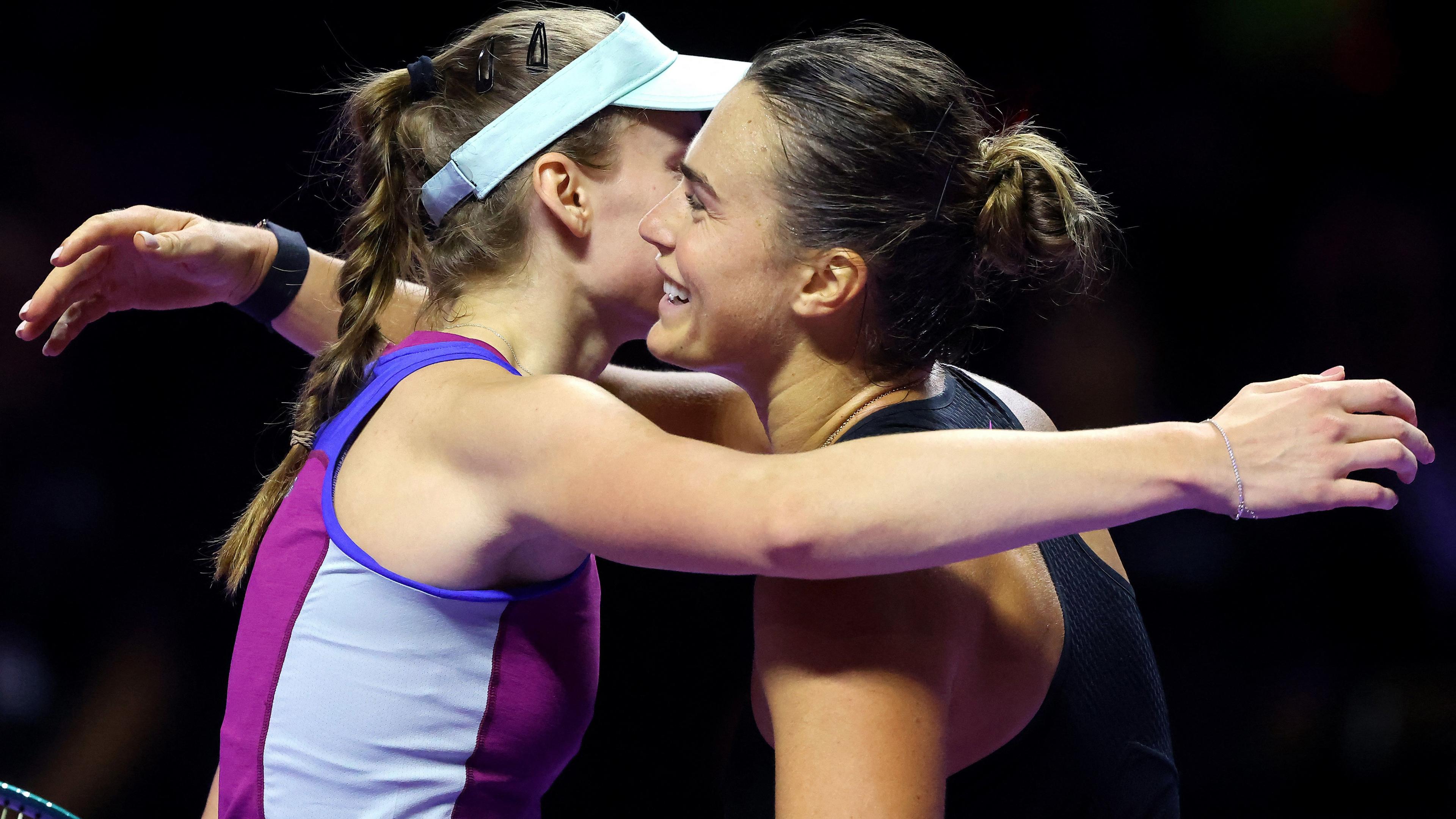 Aryna Sabalenka hugs Elena Rybakina at the WTA Finals