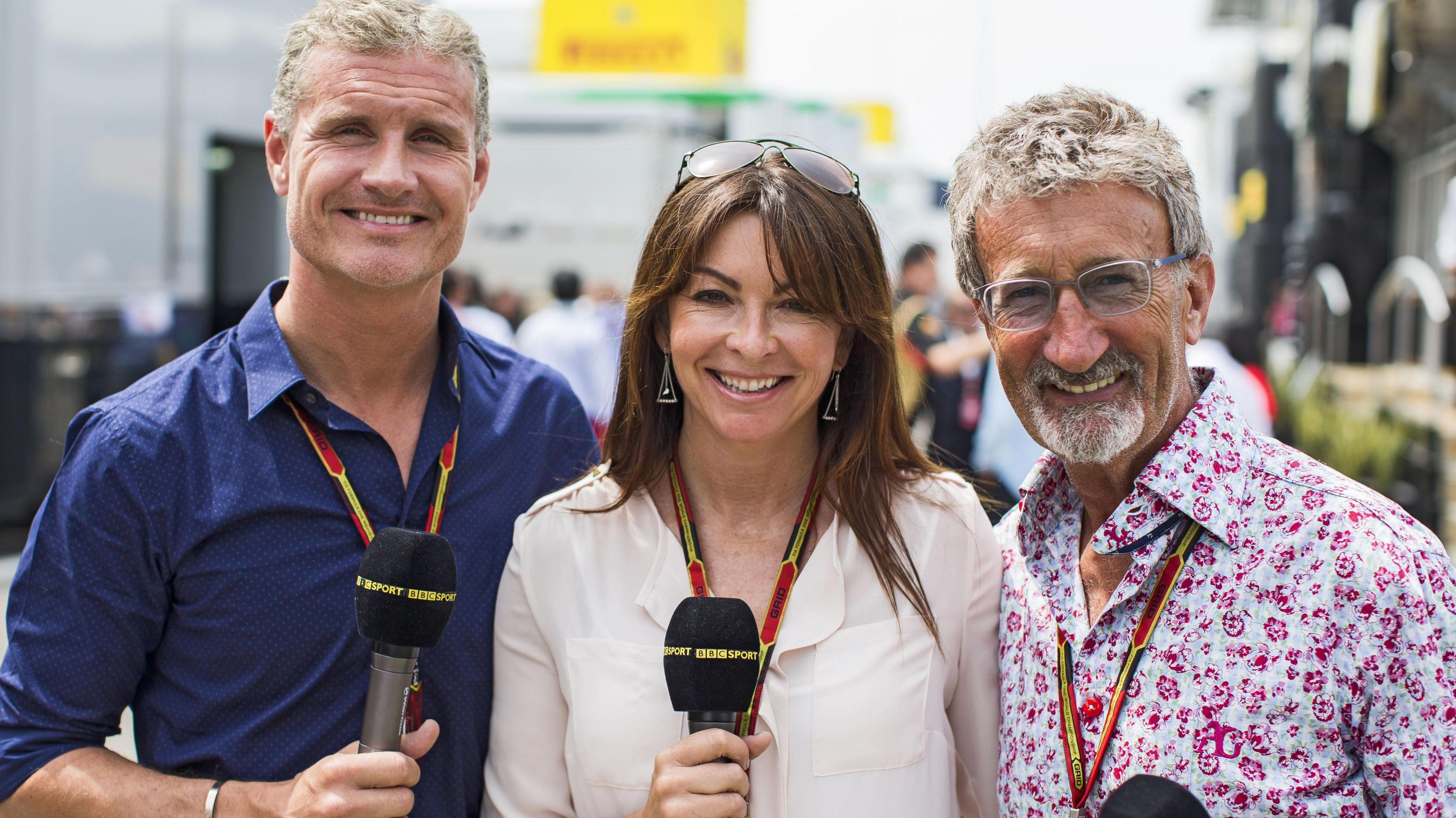 Posing for a photograph with presenter Suzi Perry and fellow pundit David Coulthard while working on the BBC's F1 TV coverage in 2015