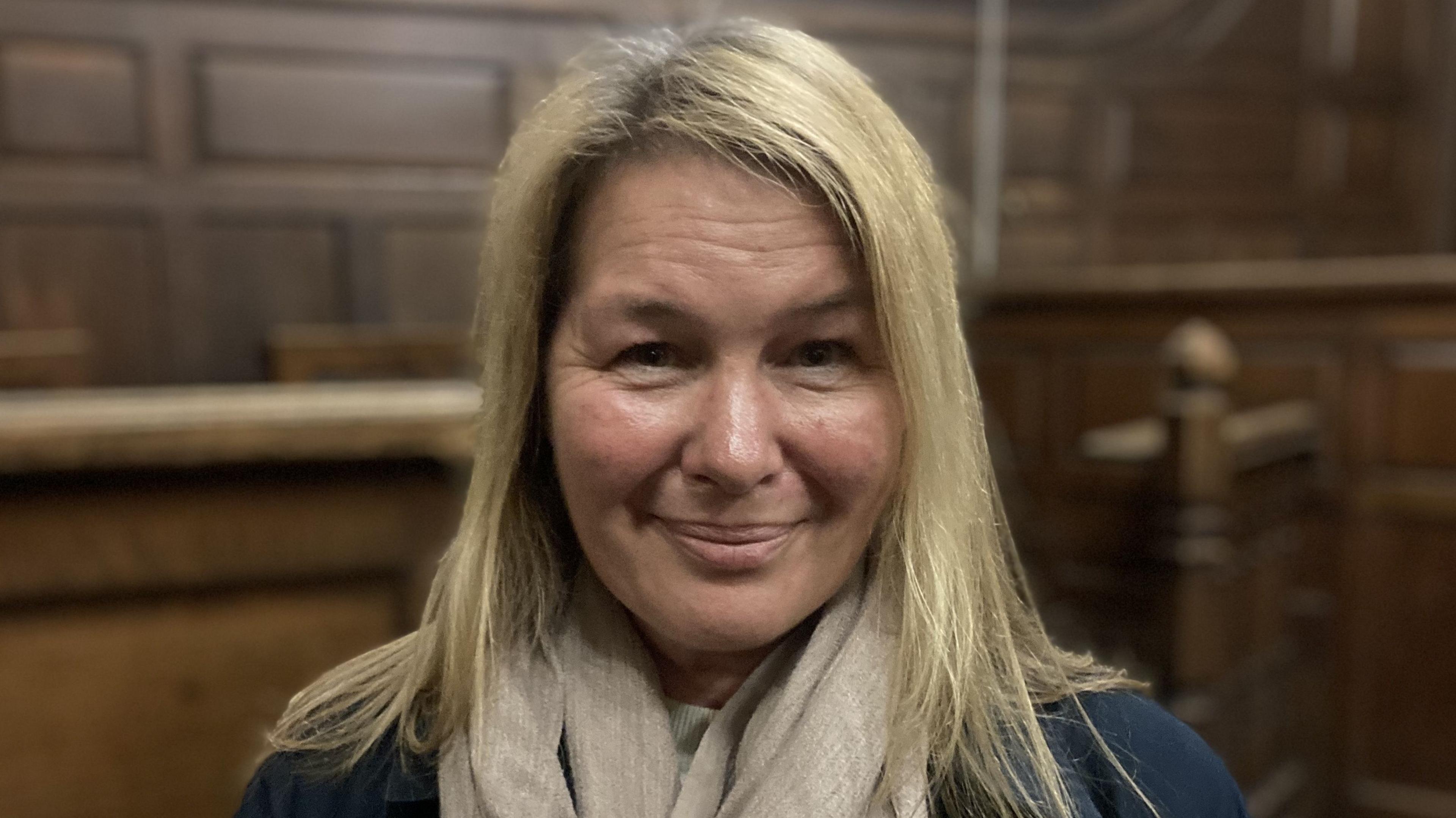 Salisbury resident, Jo Fotheringham, smiling with shoulder length blonde hair