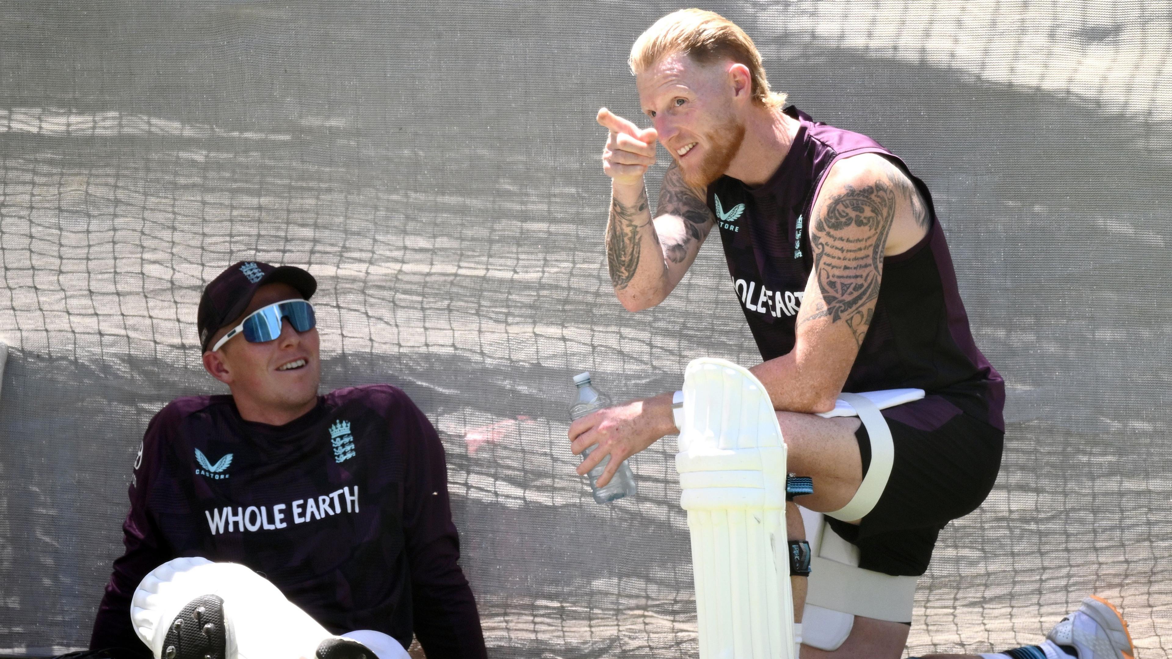 Zak Crawley looks up to a pointing Ben Stokes at practice