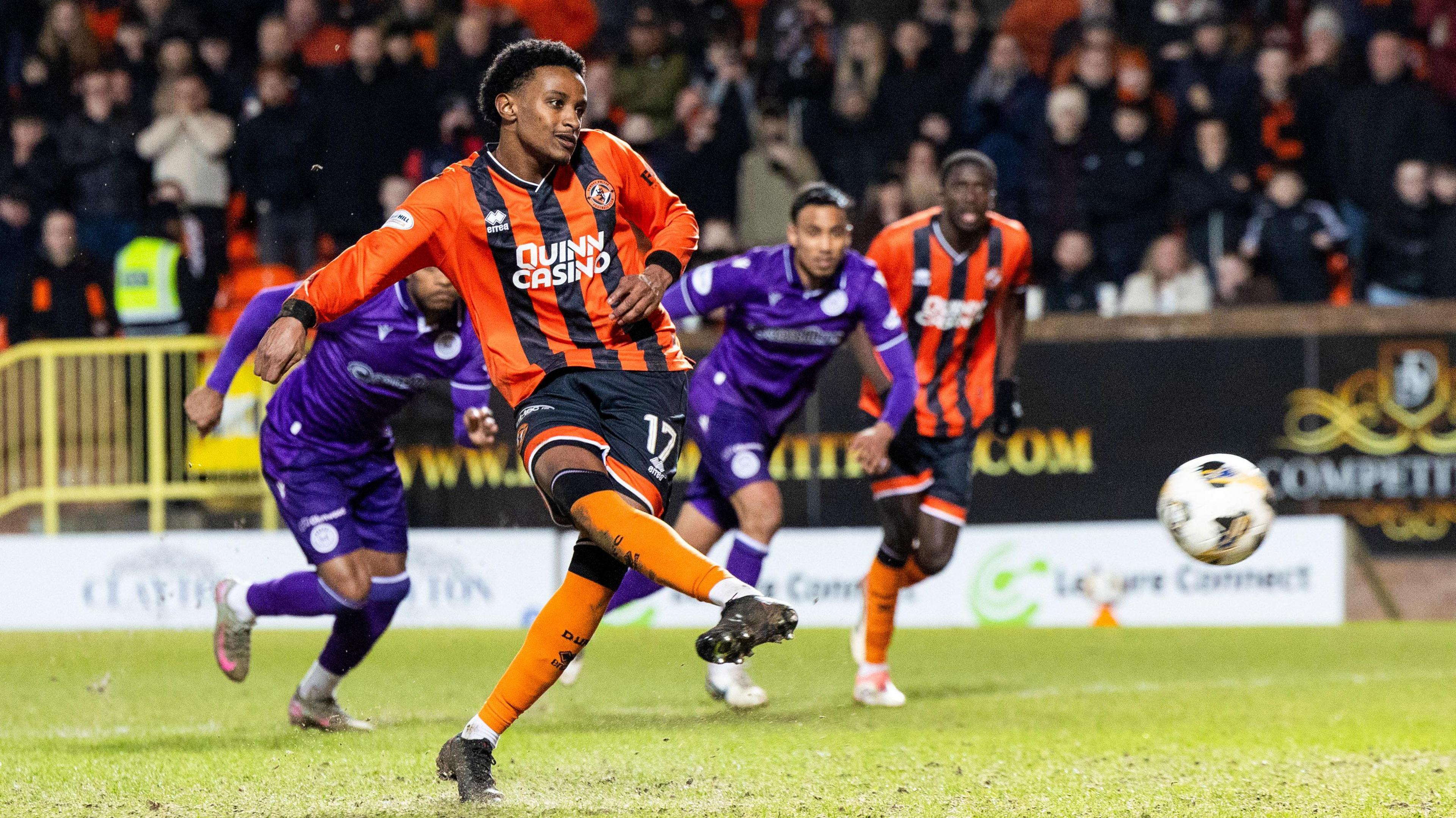 Amar Fatah scores a penalty for Dundee United against St Mirren