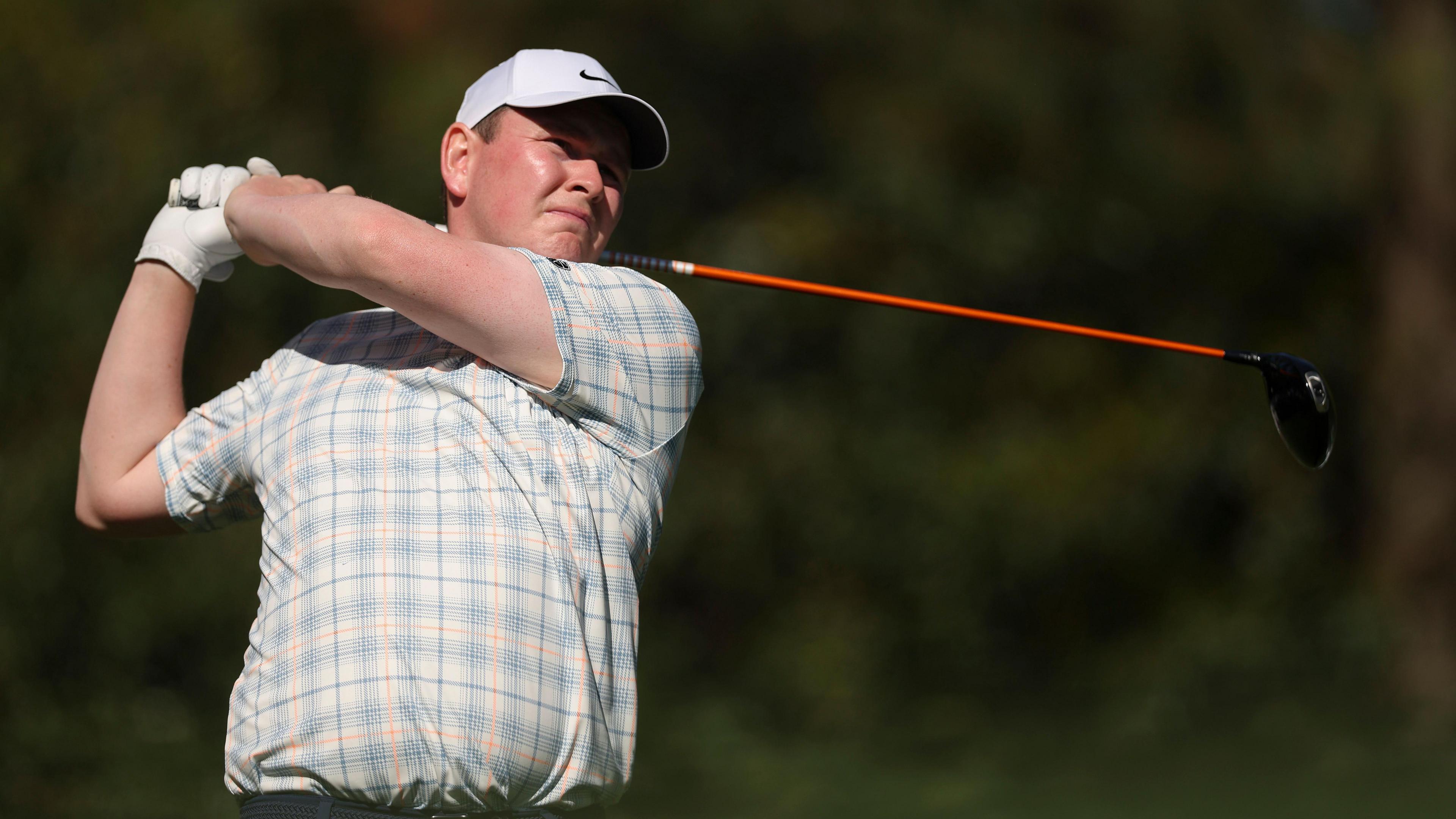 Robert MacIntyre playing a shot in round one of The Masters