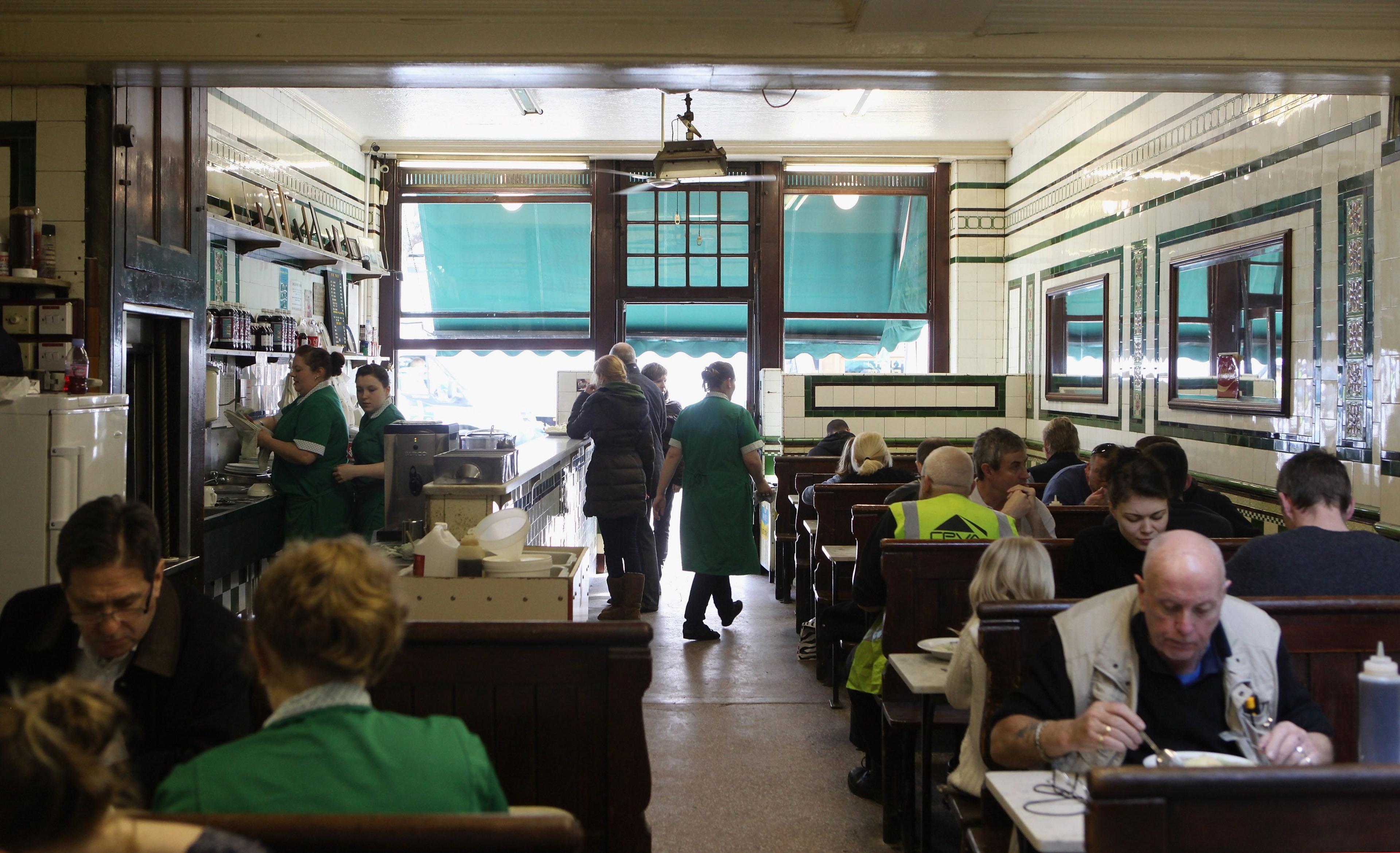 Busy pie and mash shop in London with customers 