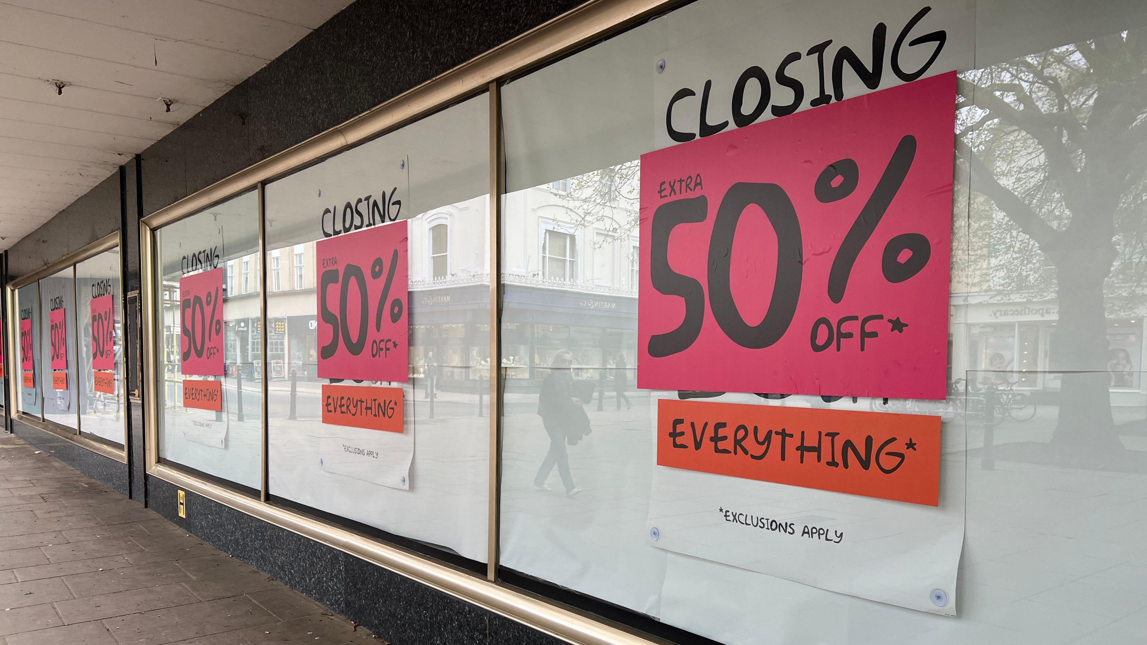 Cavendish house windows with notices advertising money off