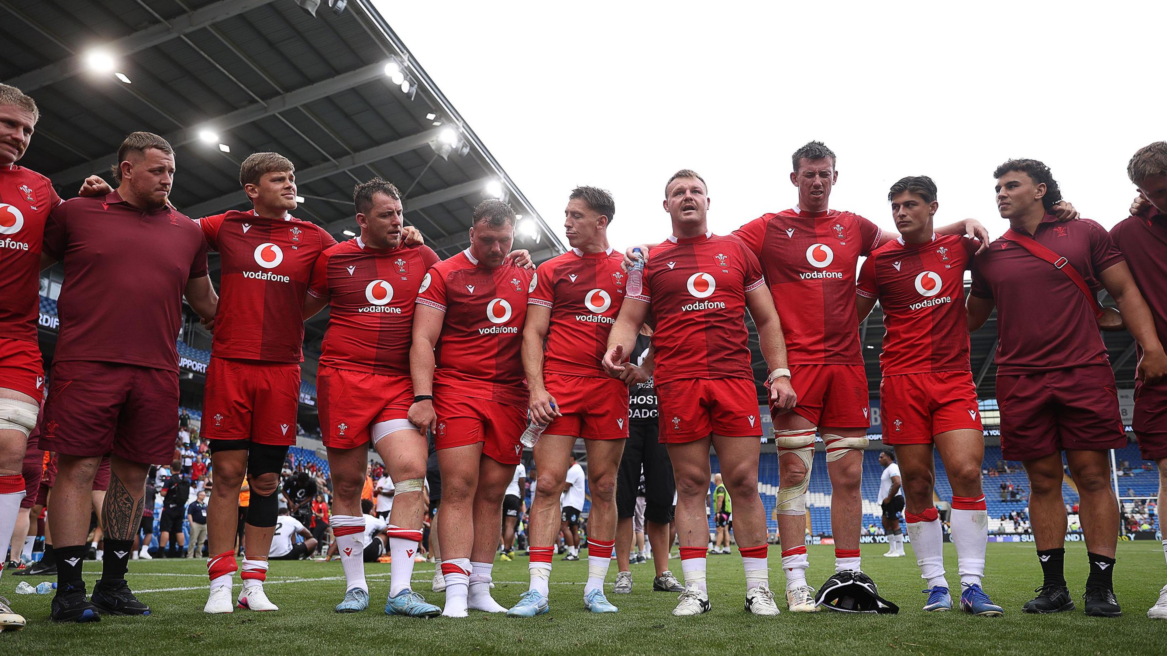 Dewi Lake speaks to his players after the 39-24 win against Fiji