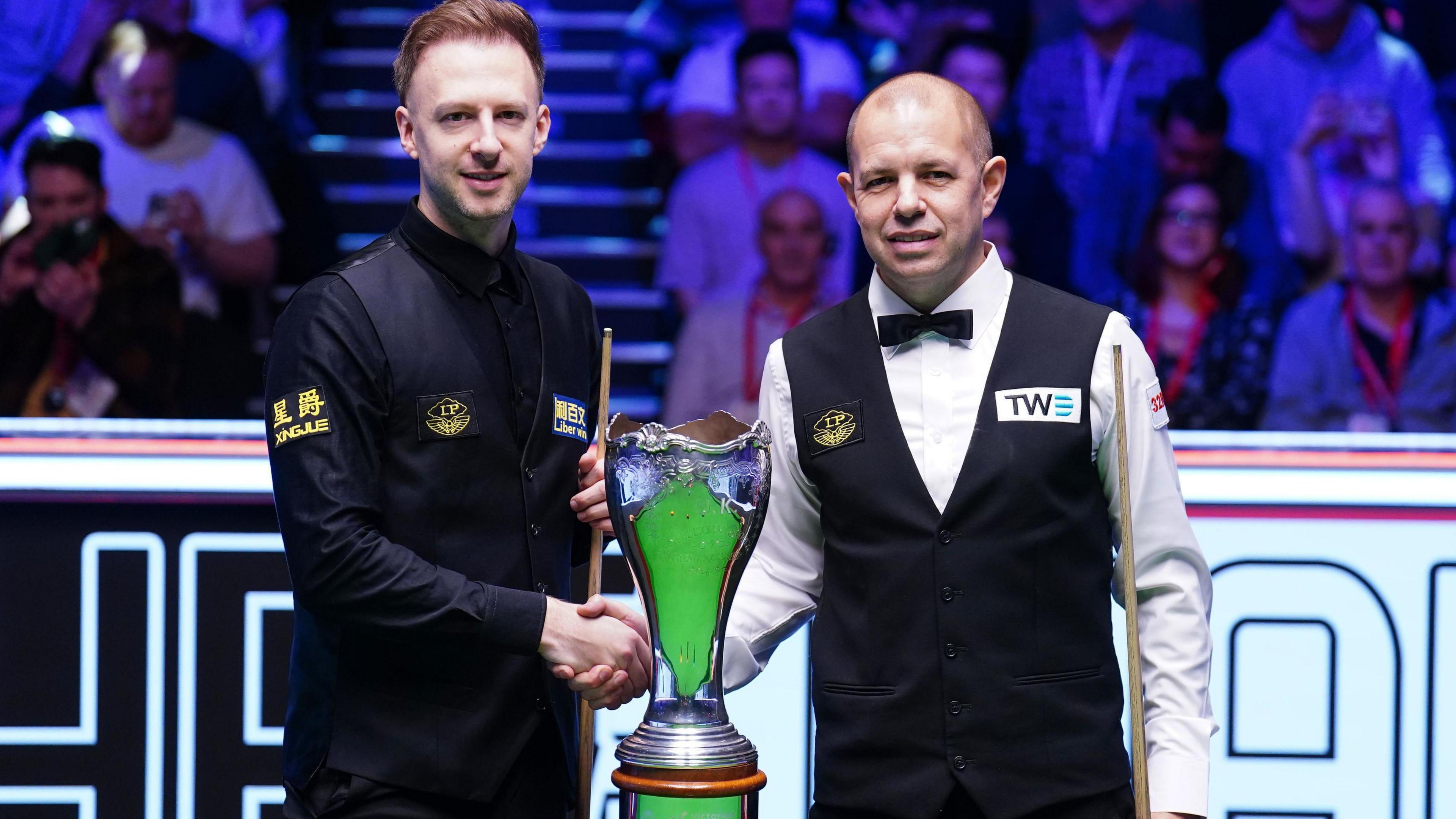 Judd Trump & Barry Hawkins shake hands before their UK Championship final