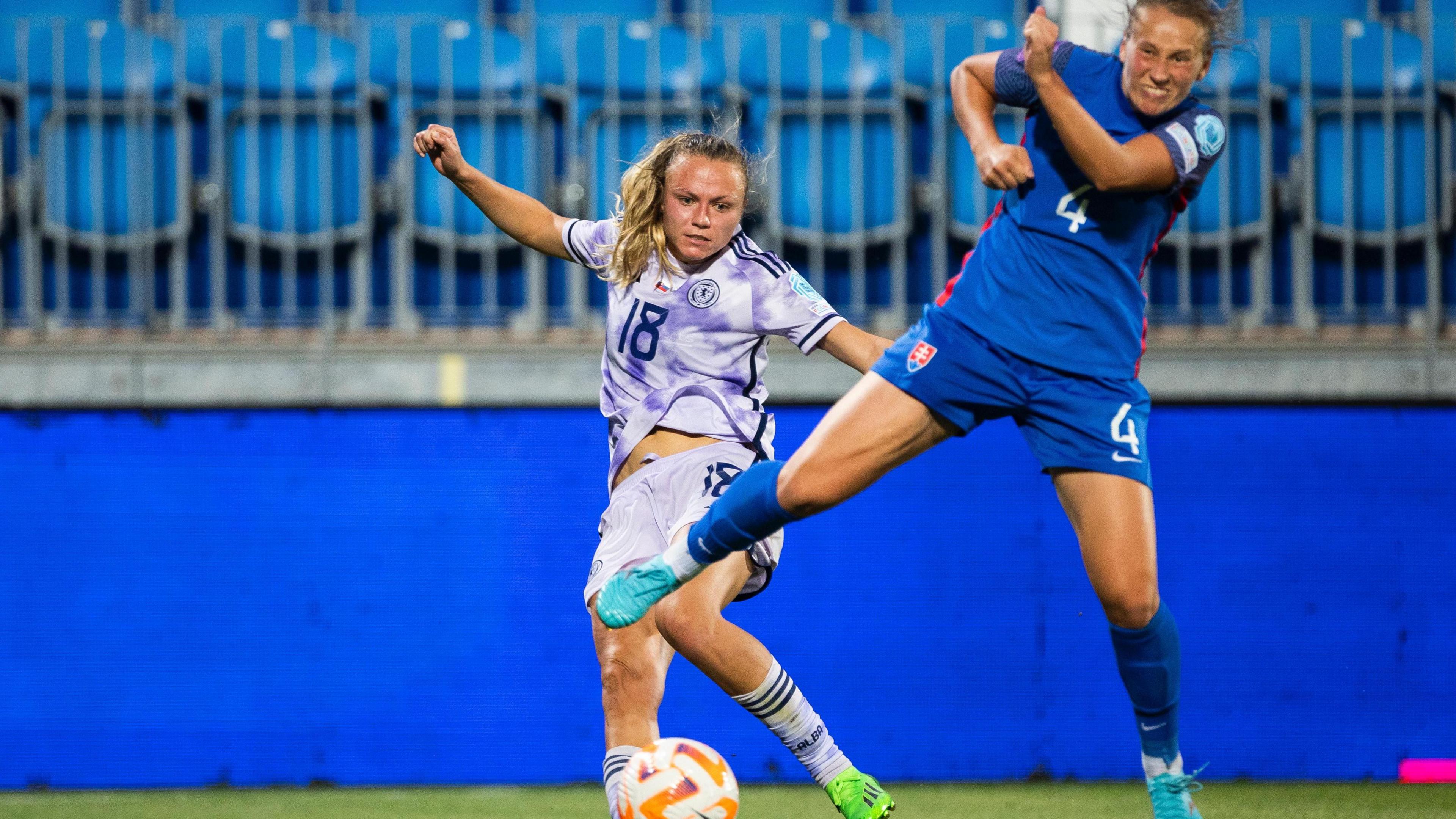 Scotland's Claire Emslie (left) battles for the ball