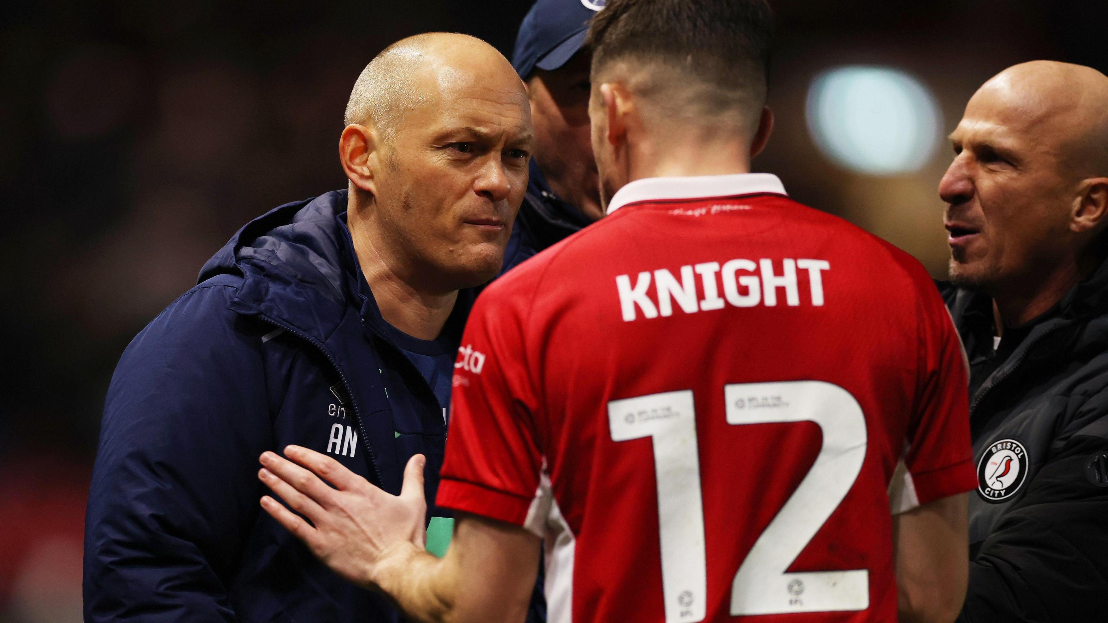 Alex Neil and Jason Knight confront each other