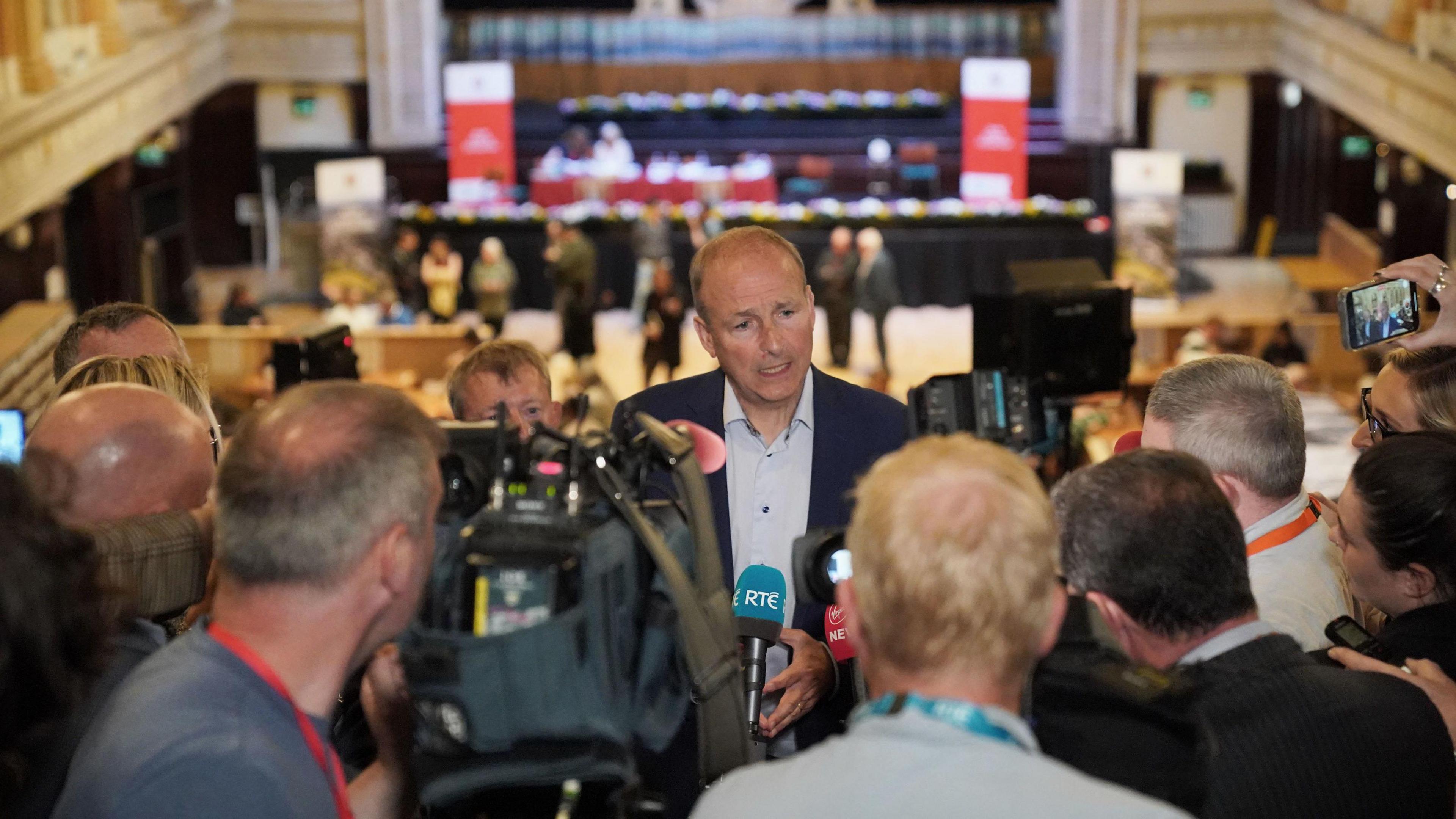 Tánaiste Micheál Martin speaks to a group of reporters in Cork City Hall 