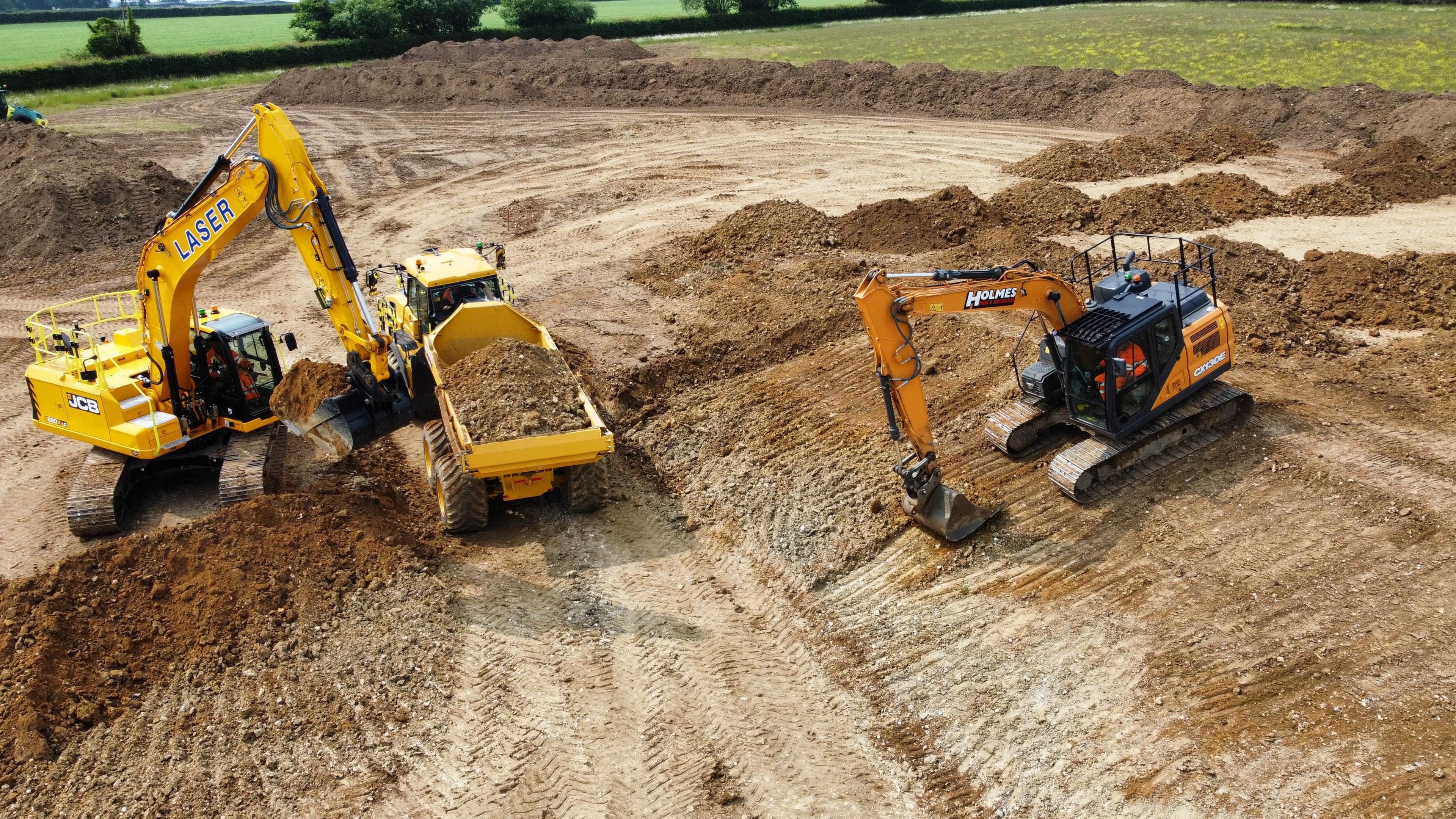 Diggers excavating a large swathe of land