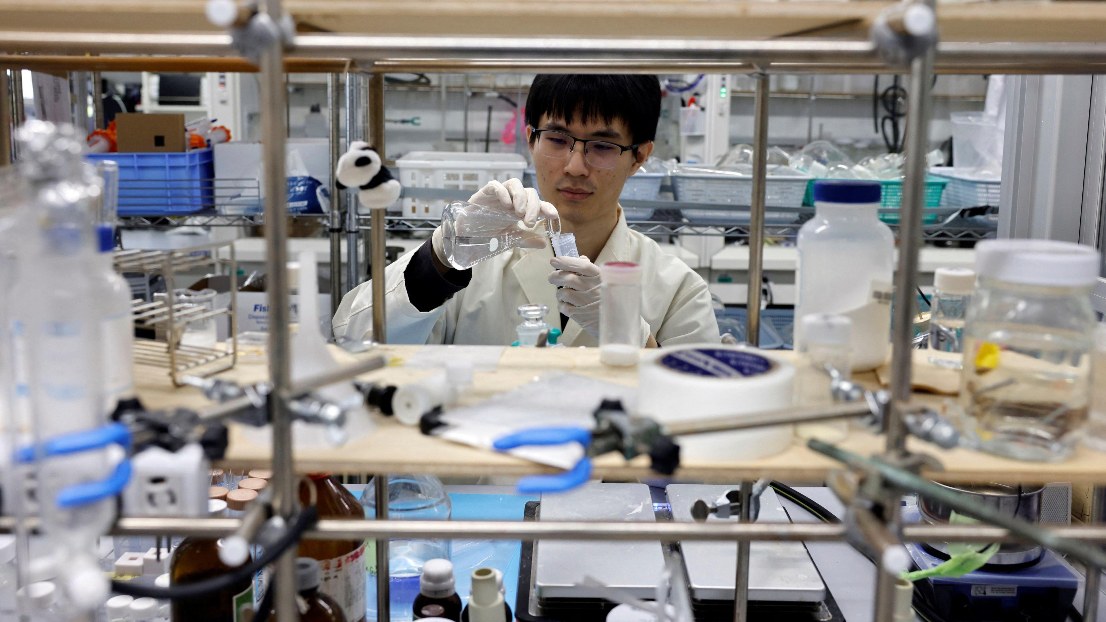 A scientist in a laboratory.