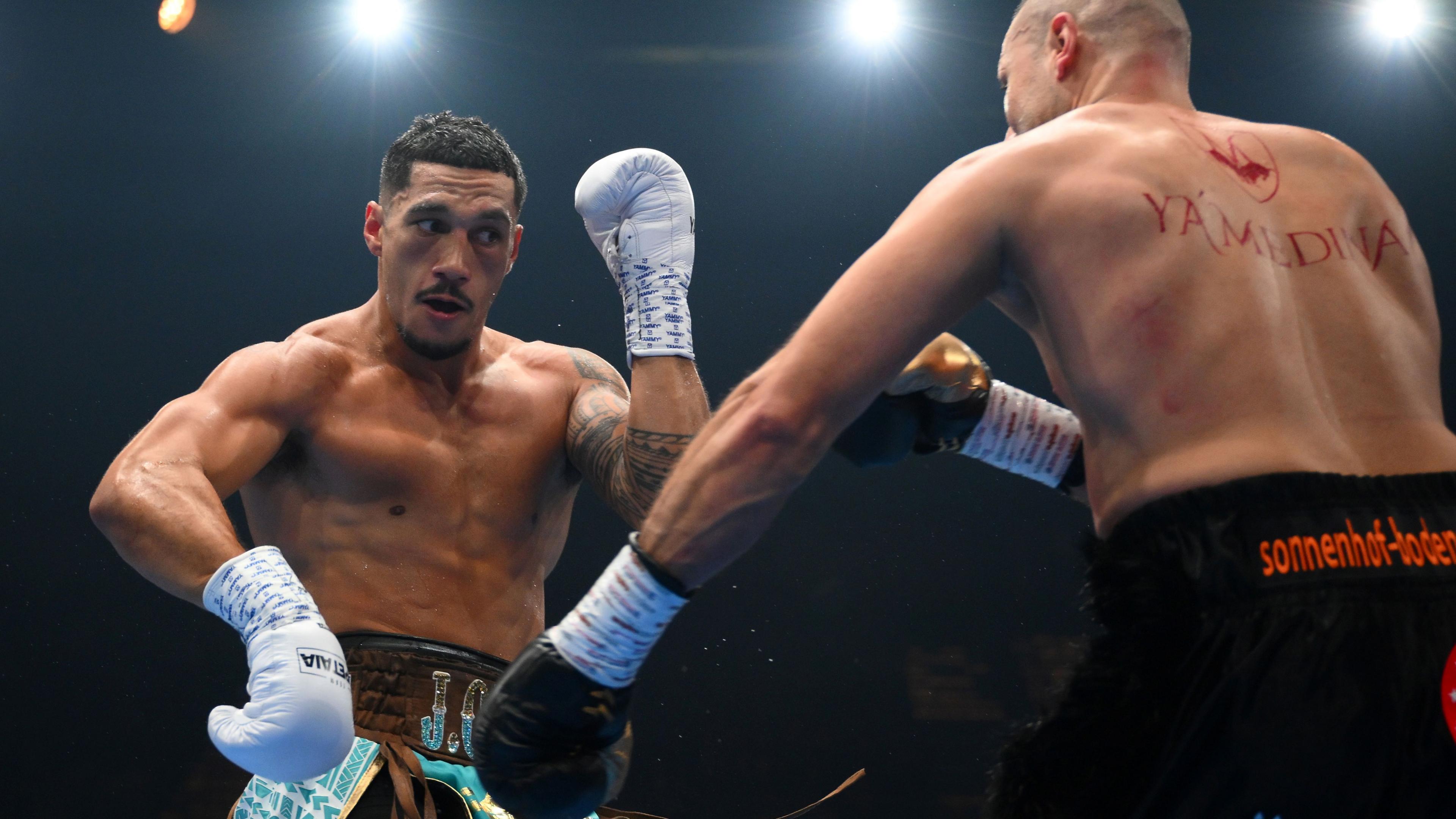 Huseyin Cinkara punches Jai Opetaia during the IBF & Ring Magazine Cruiserweight World Title bout between Jai Opetaia and Huseyin Cinkara