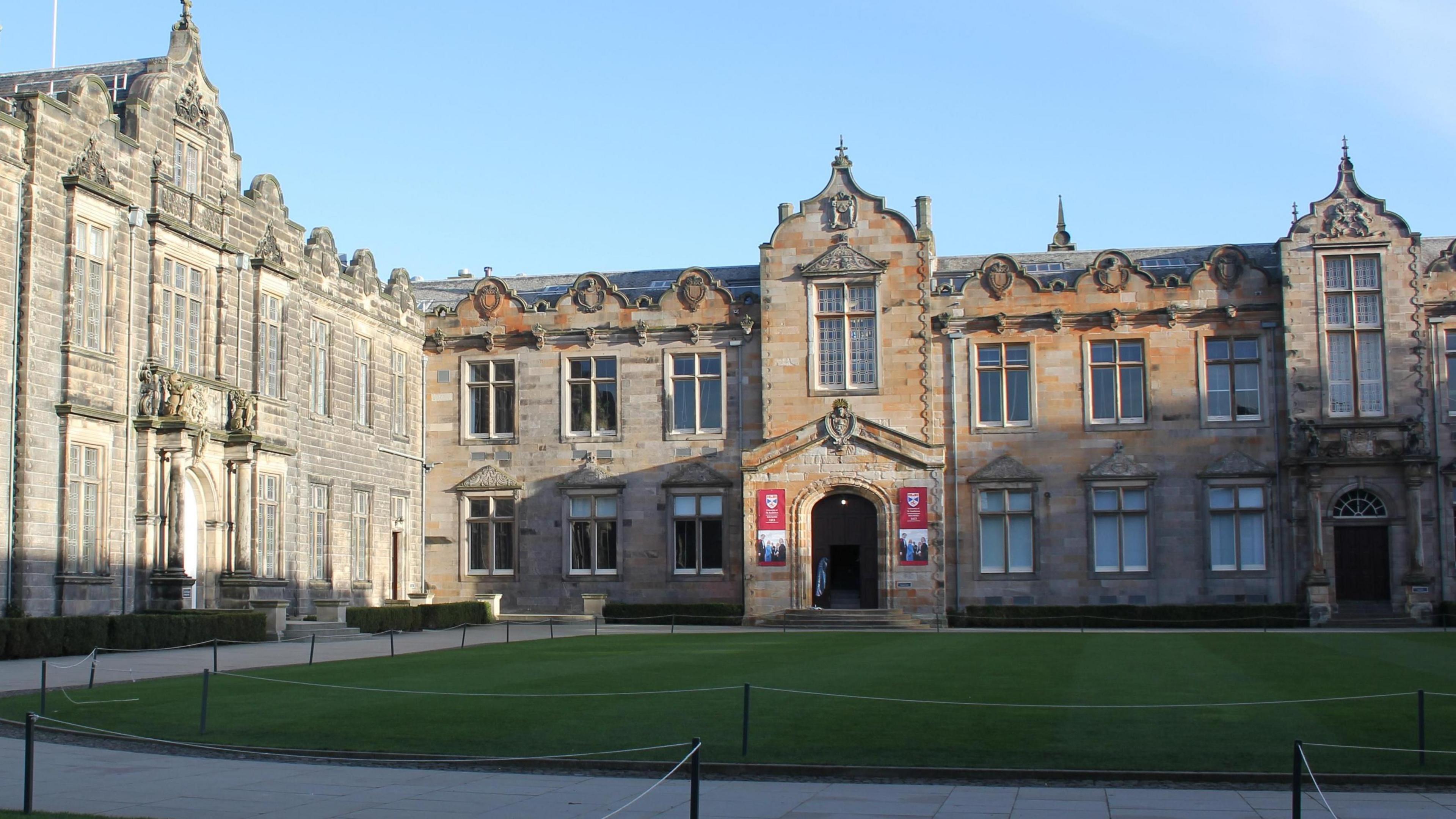 University of St Andrews buildings behind grass lawn