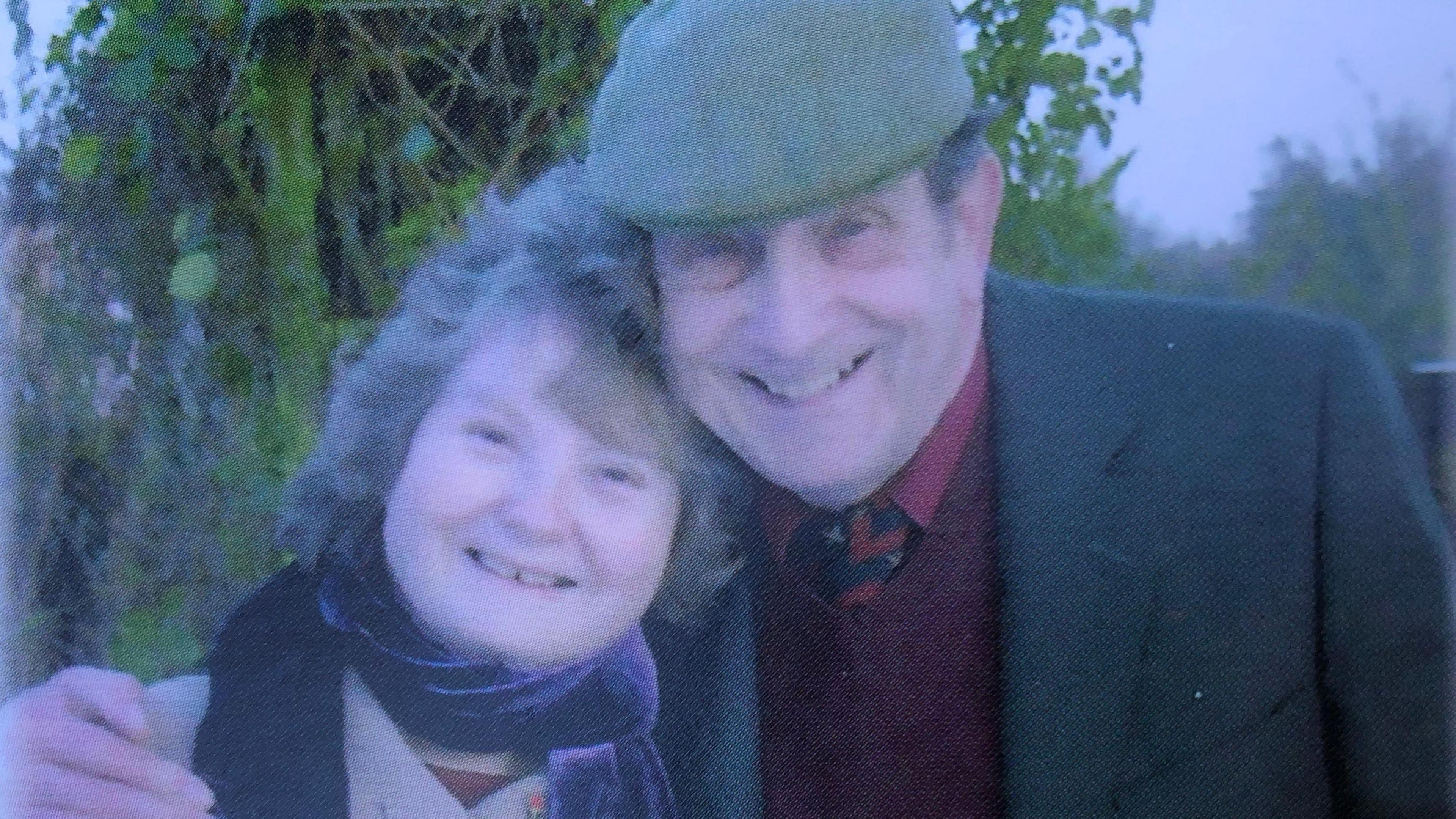 Ellen and David Beeton pictured in scarves and coats several years ago.