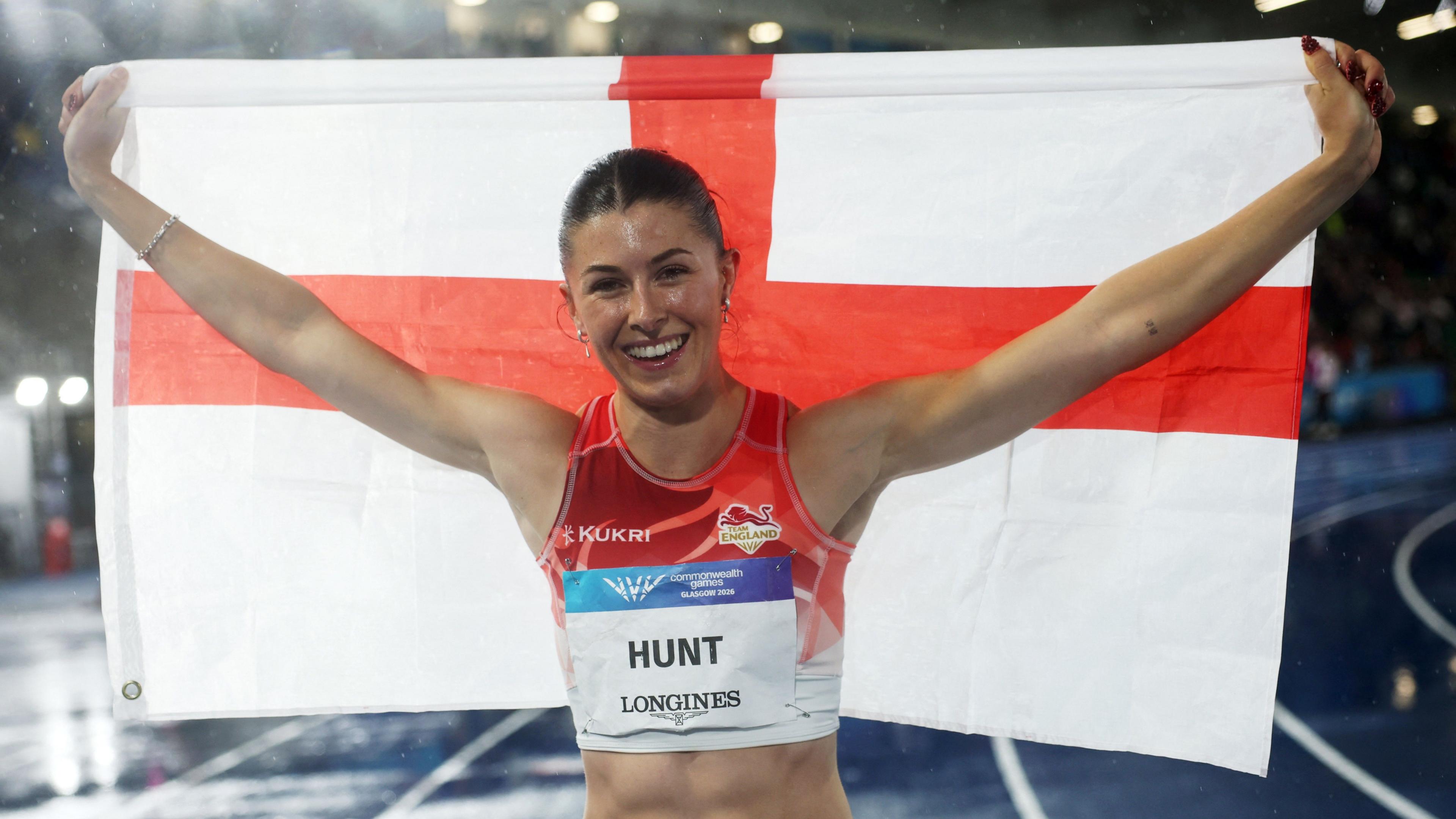 England's Amy Hunt celebrates winning a silver medal in the 100m at the Commonwealth Games in Glasgow