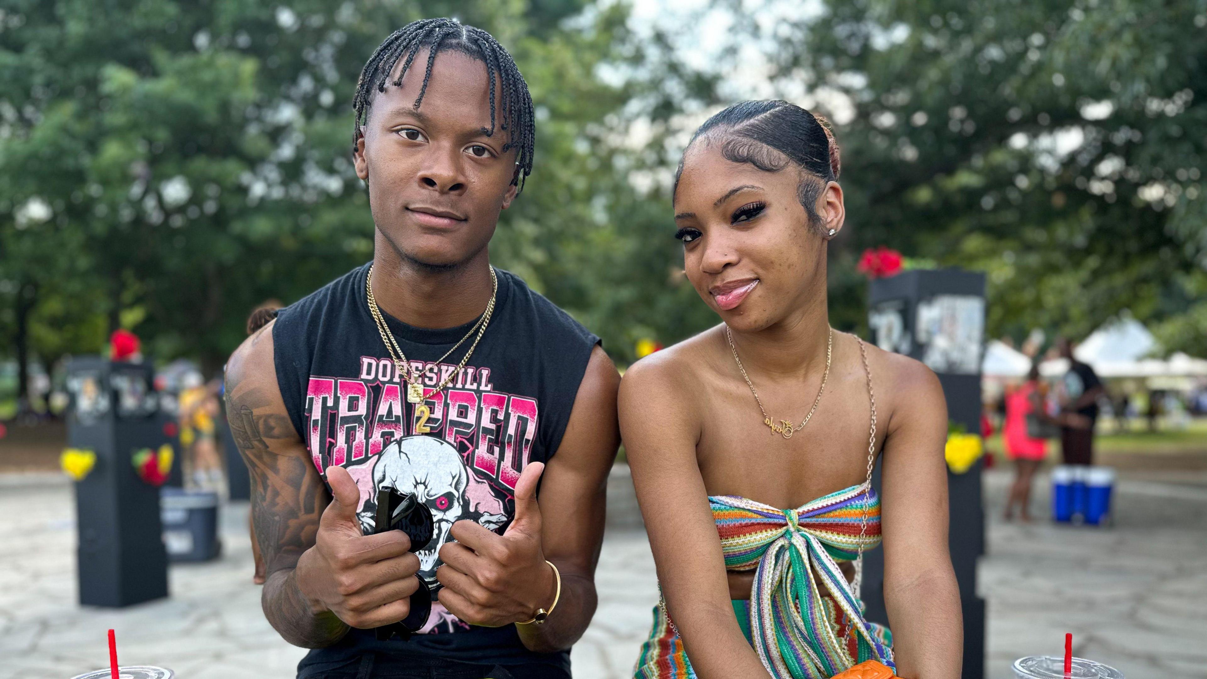 Shaun Gray sits next to his girlfriend at the Juneteenth celebration in Atlanta, Georgia