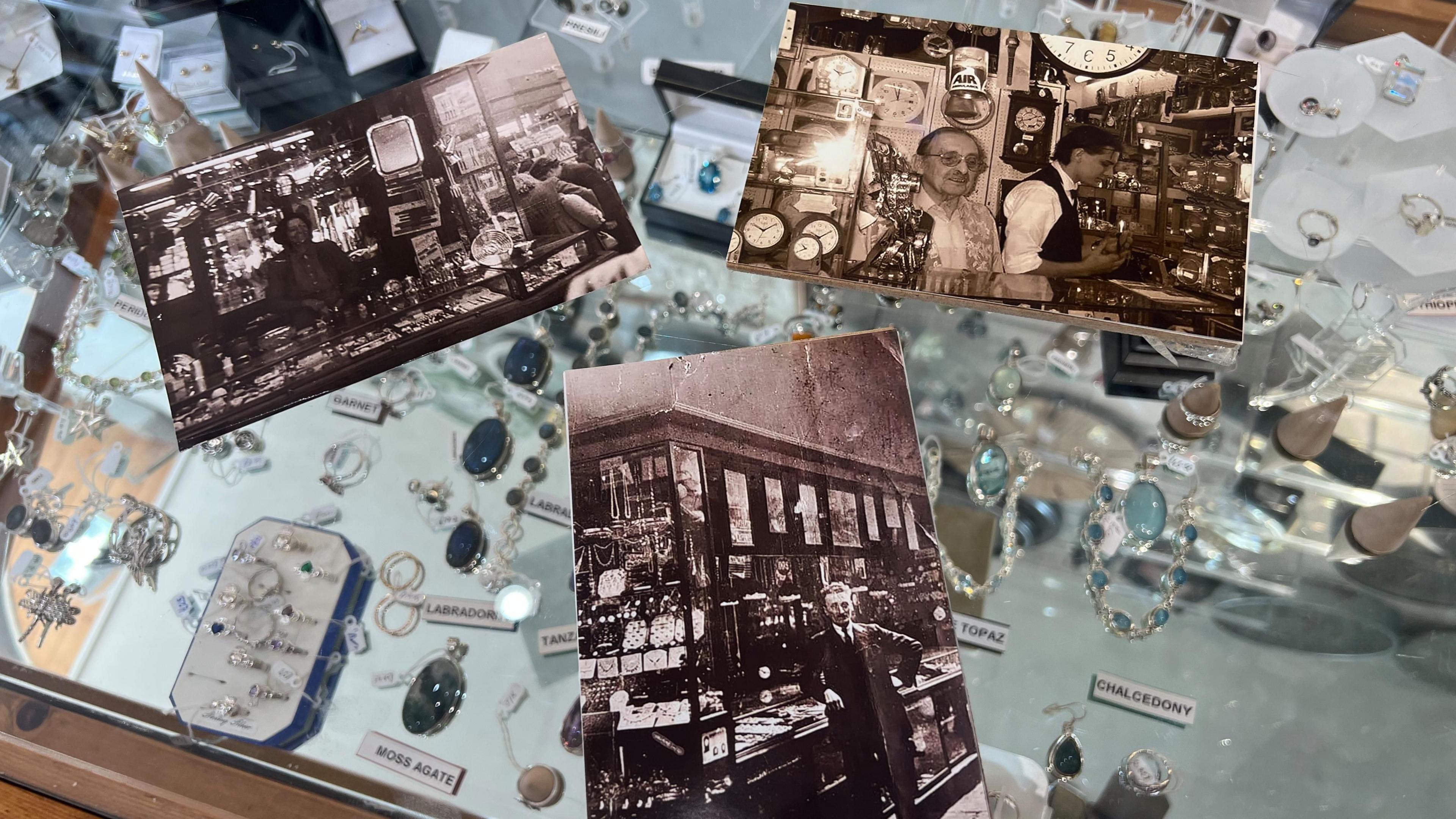 Three old black and white photographs showing people behind a market stall