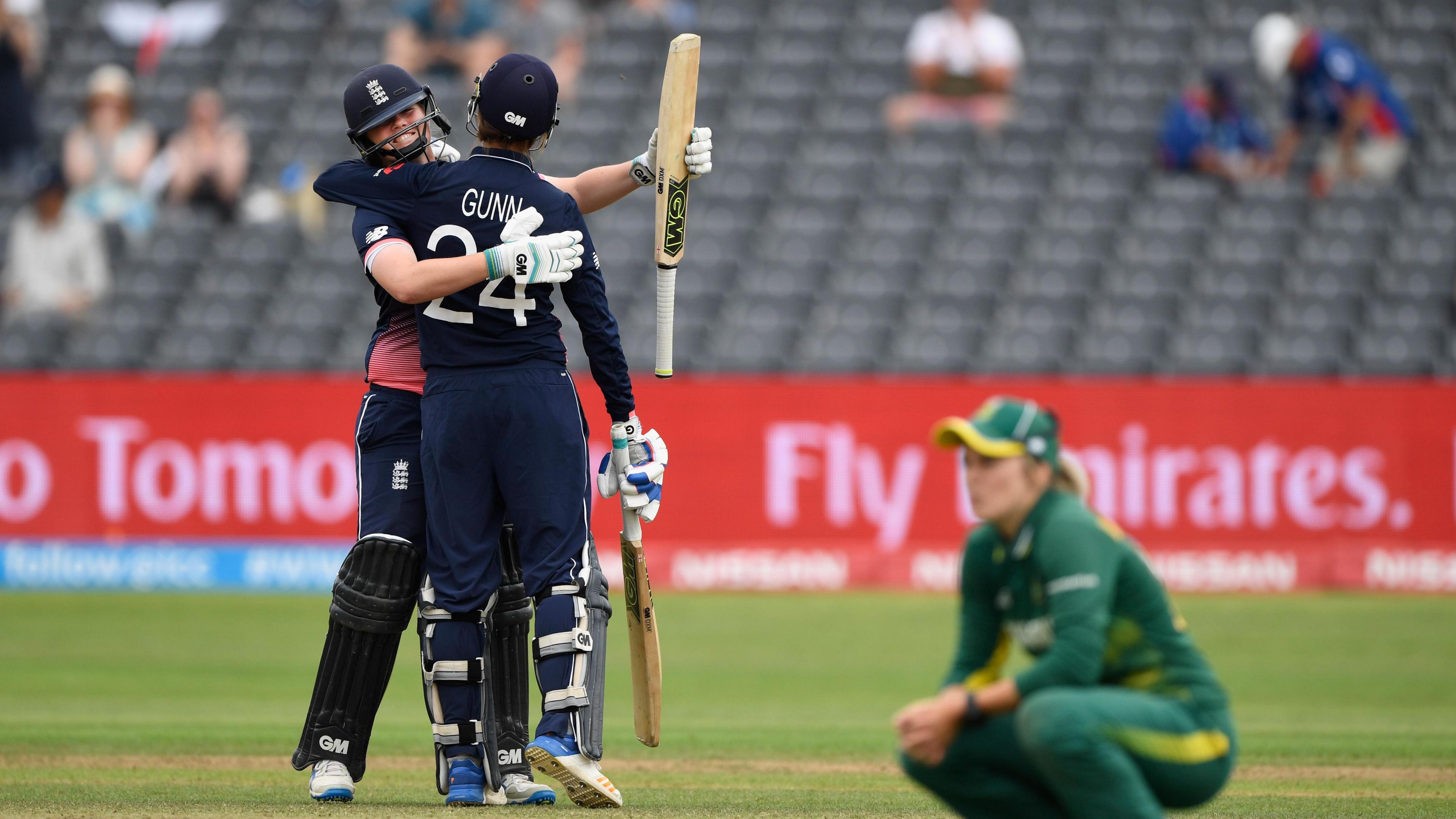 Anya Shrubsole and Jenny Gunn hug on the pitch after sealing victory against South Africa