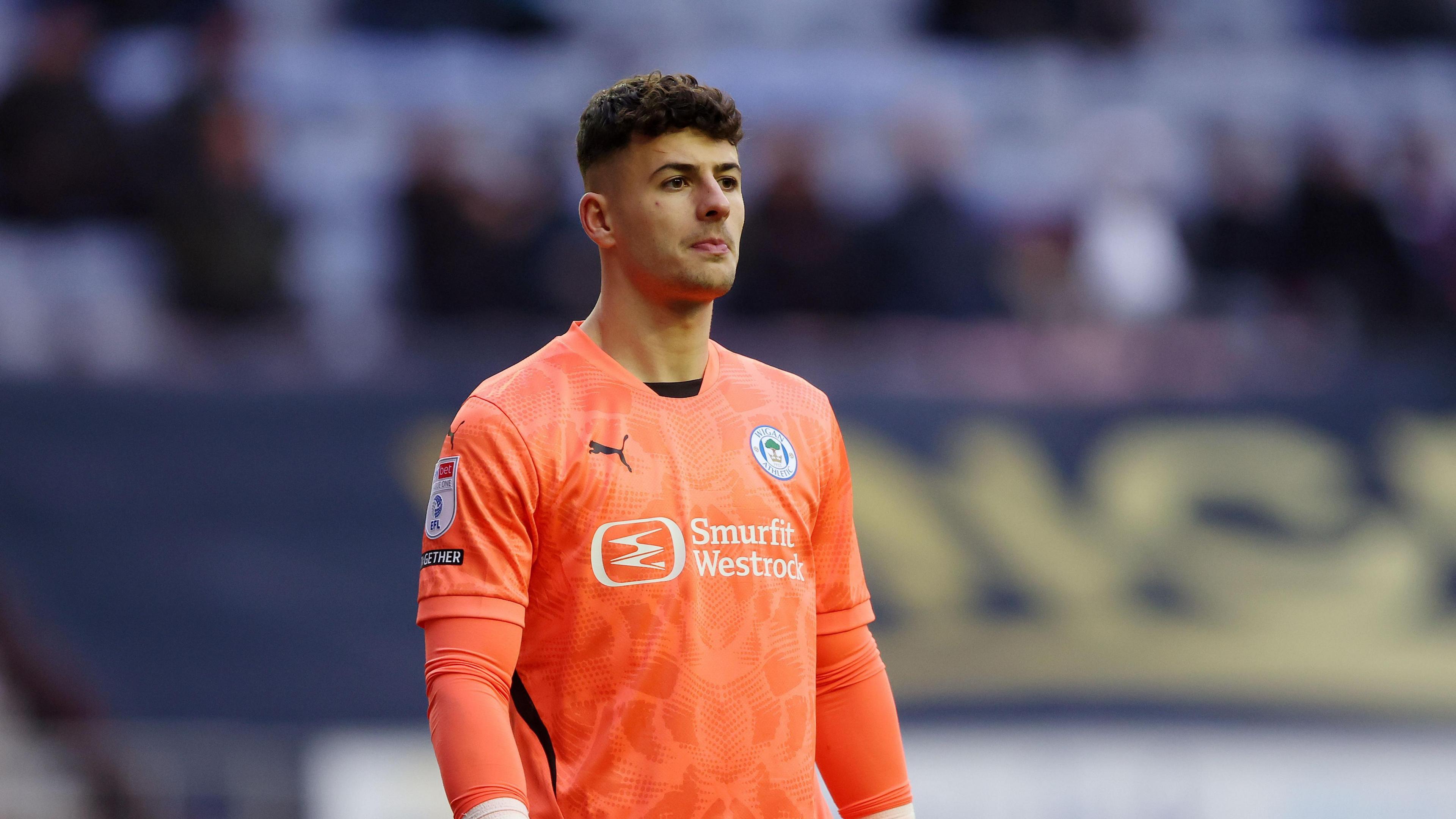 Goal keeper Sam Tickle playing for Wigan Athletic