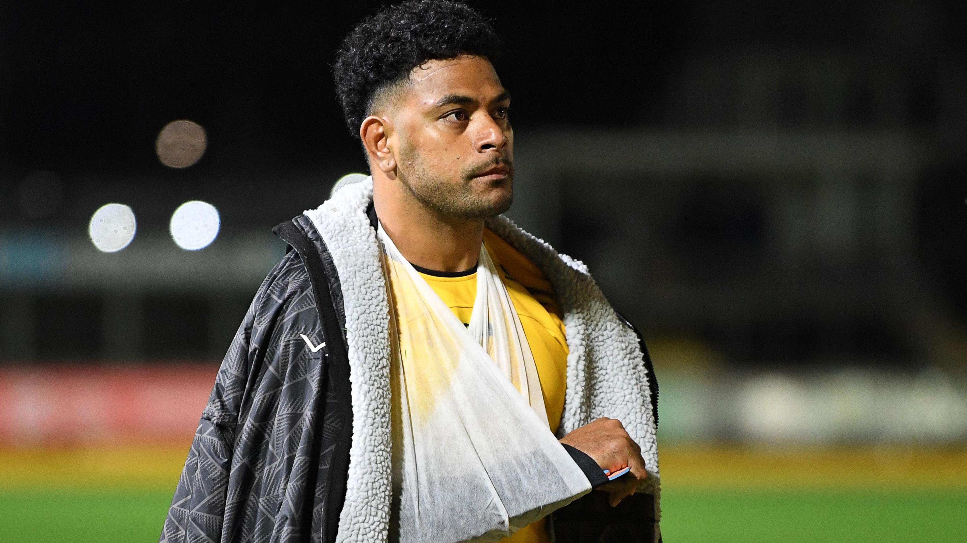 Fetuli Paea with his right arm in a sling after Dragons' draw with Sharks