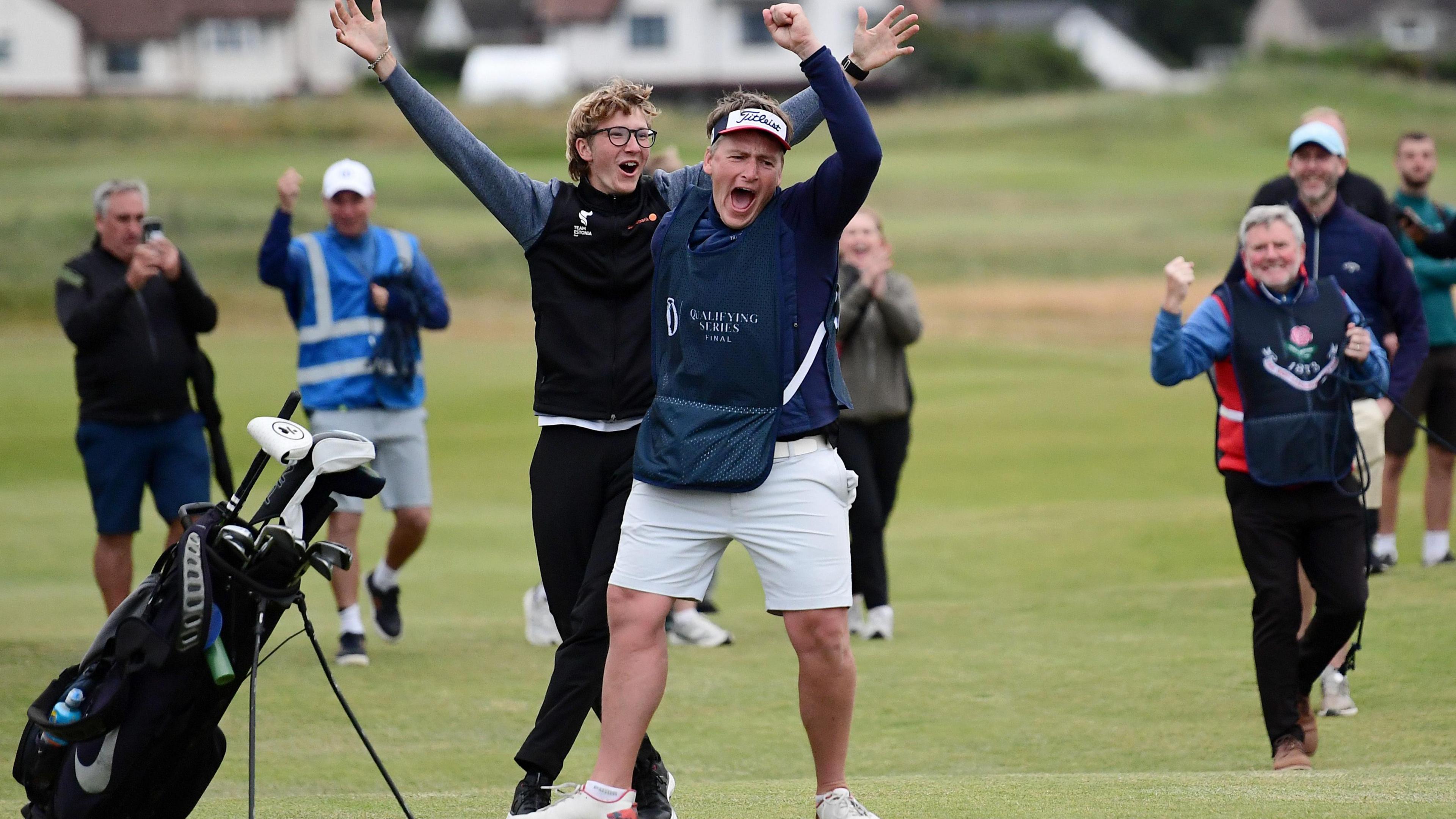Richard Teder celebrates with his caddie after holing a 70-yard chip shot to become the first Estonian to qualify for The Open