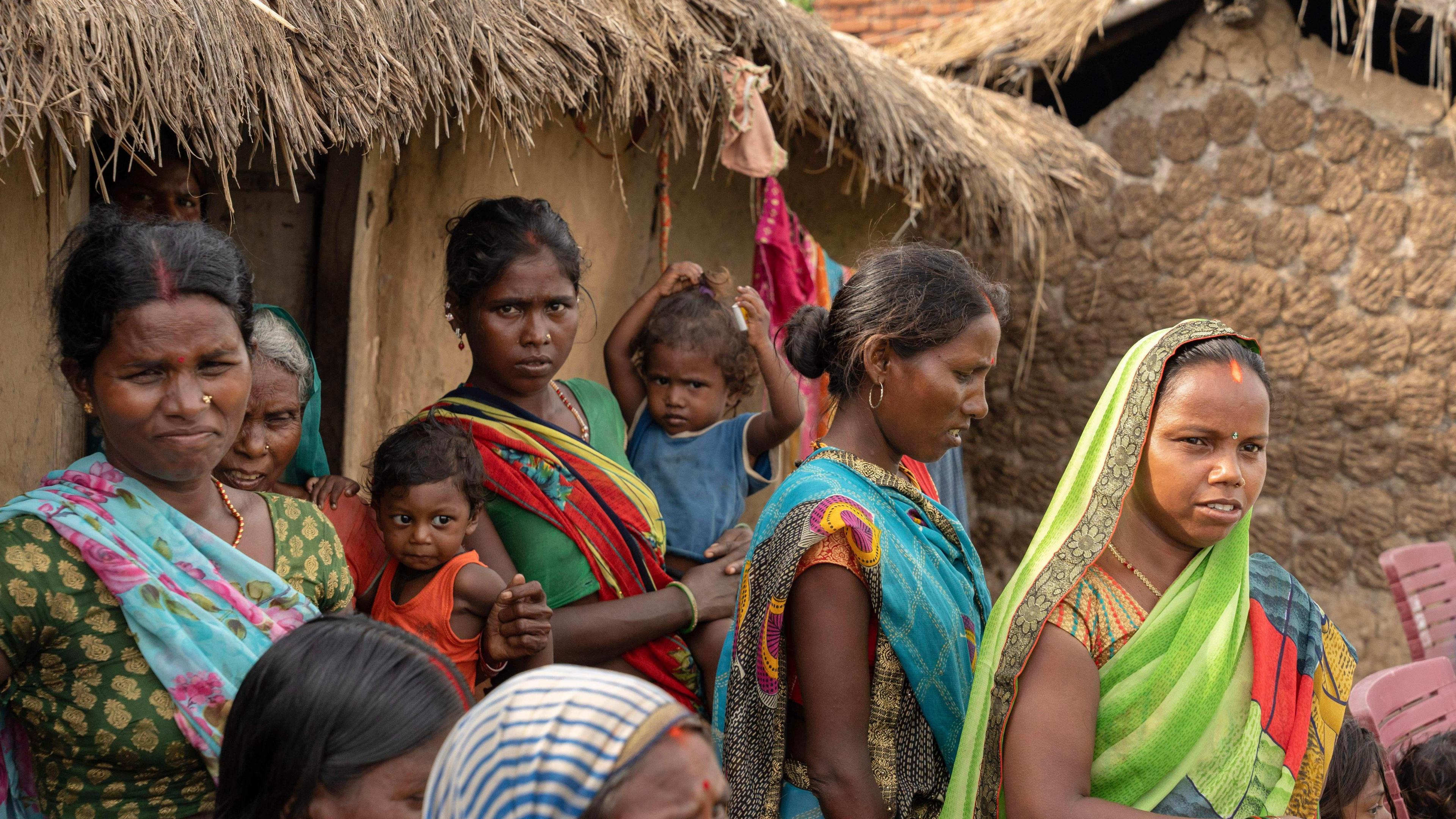 Rekha Devi (extreme left in a light blue saree with pink flowers) and other residents of Danara village, 35km from Patna district, in the Indian state of Bihar