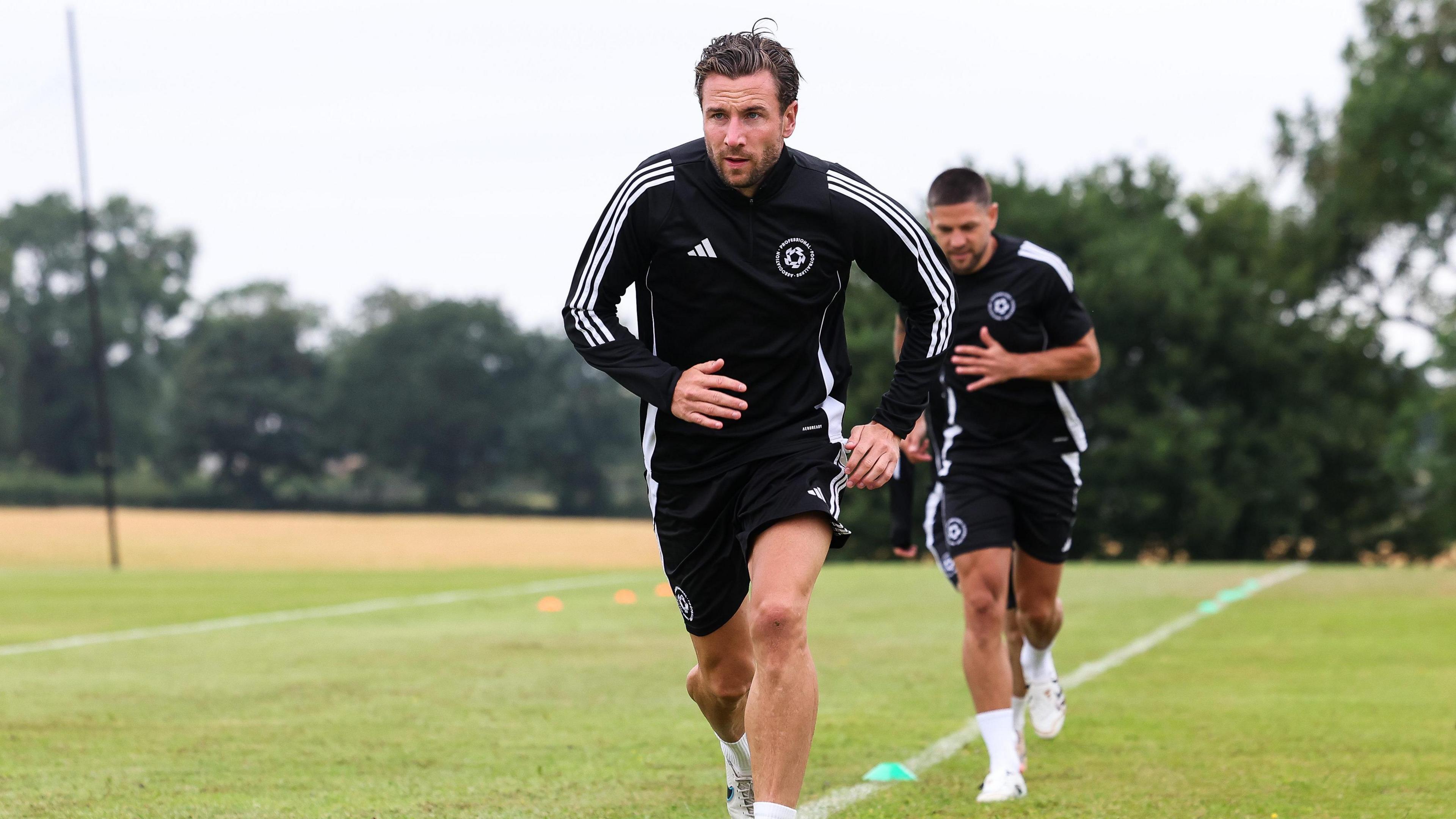 Paul Dummett running